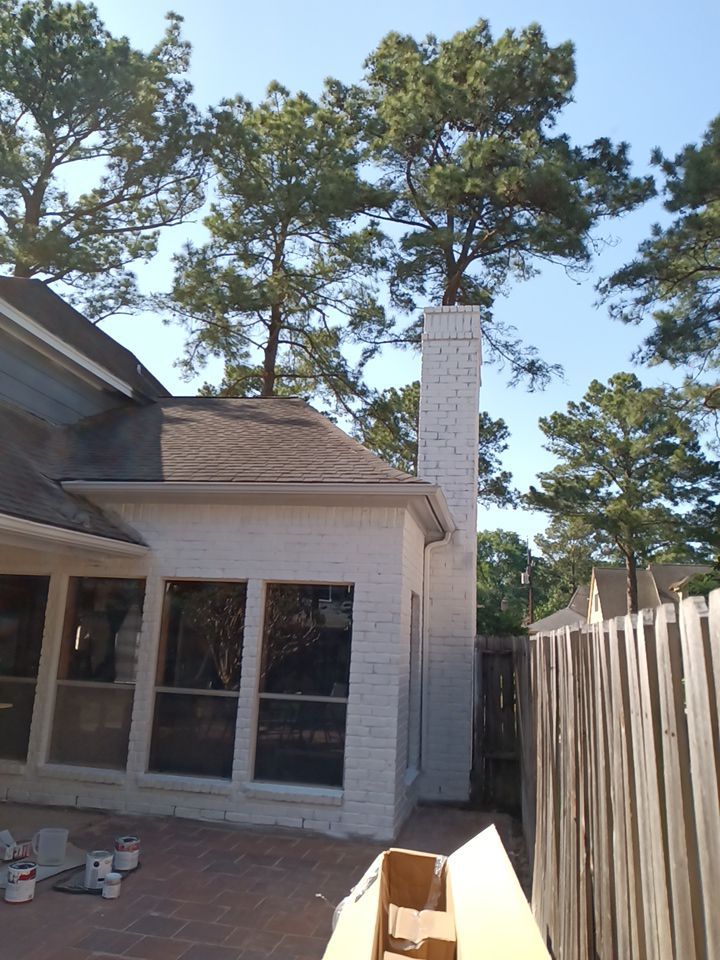 Interior and exterior painting project by Roof Concepts Construction