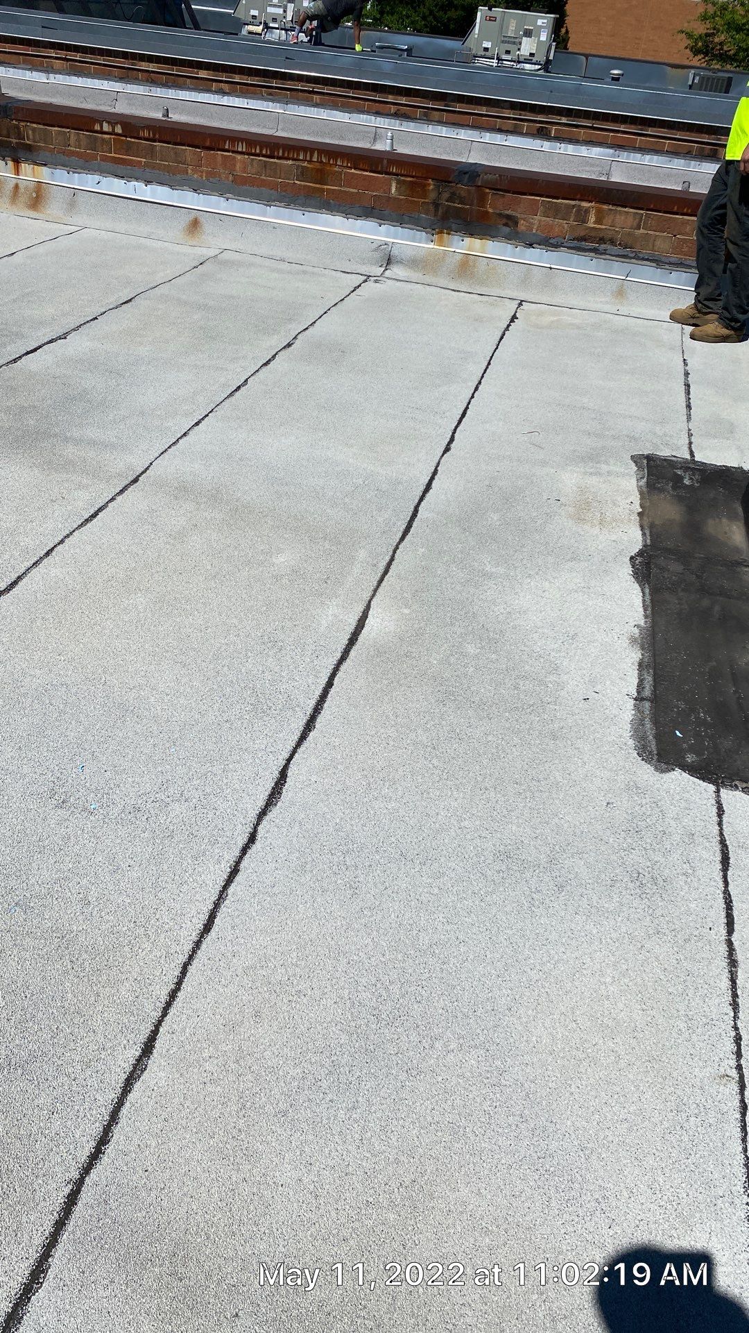 Commercial Roof Coating using Fiberseal basecoat and Silicon Topcoat by Just In Time Roofing and Restoration