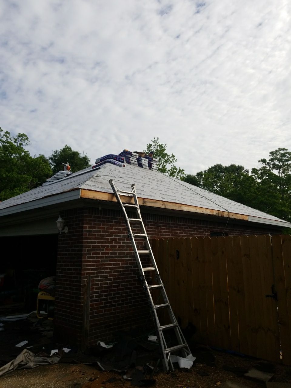 Residential Roofing Installation using Roof repair by American Roofing & Construction LLC
