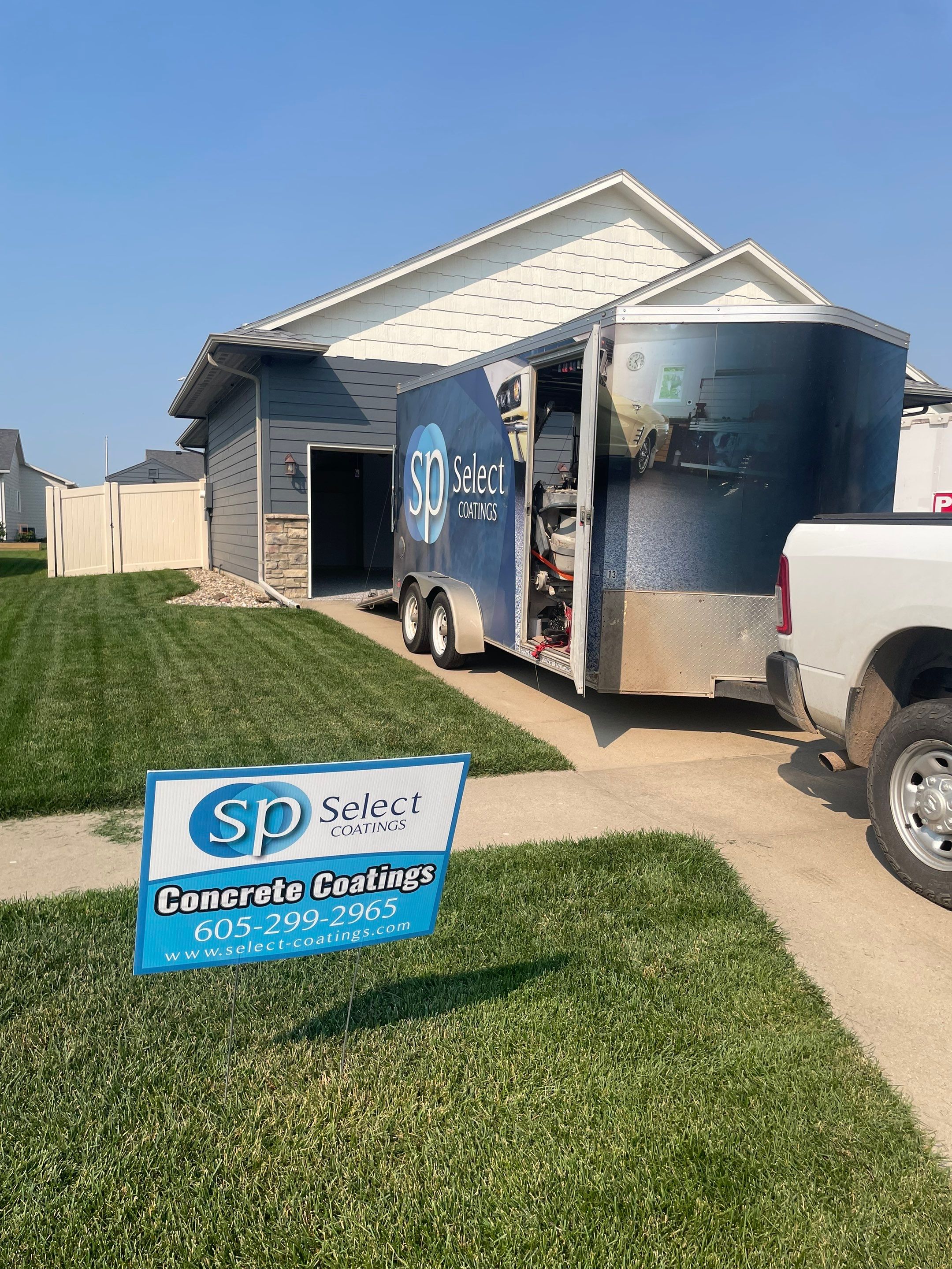 Sioux Falls Garage Concrete Coating Installation with Domino Flake by Select Painting, Coatings & Garage Cabinets