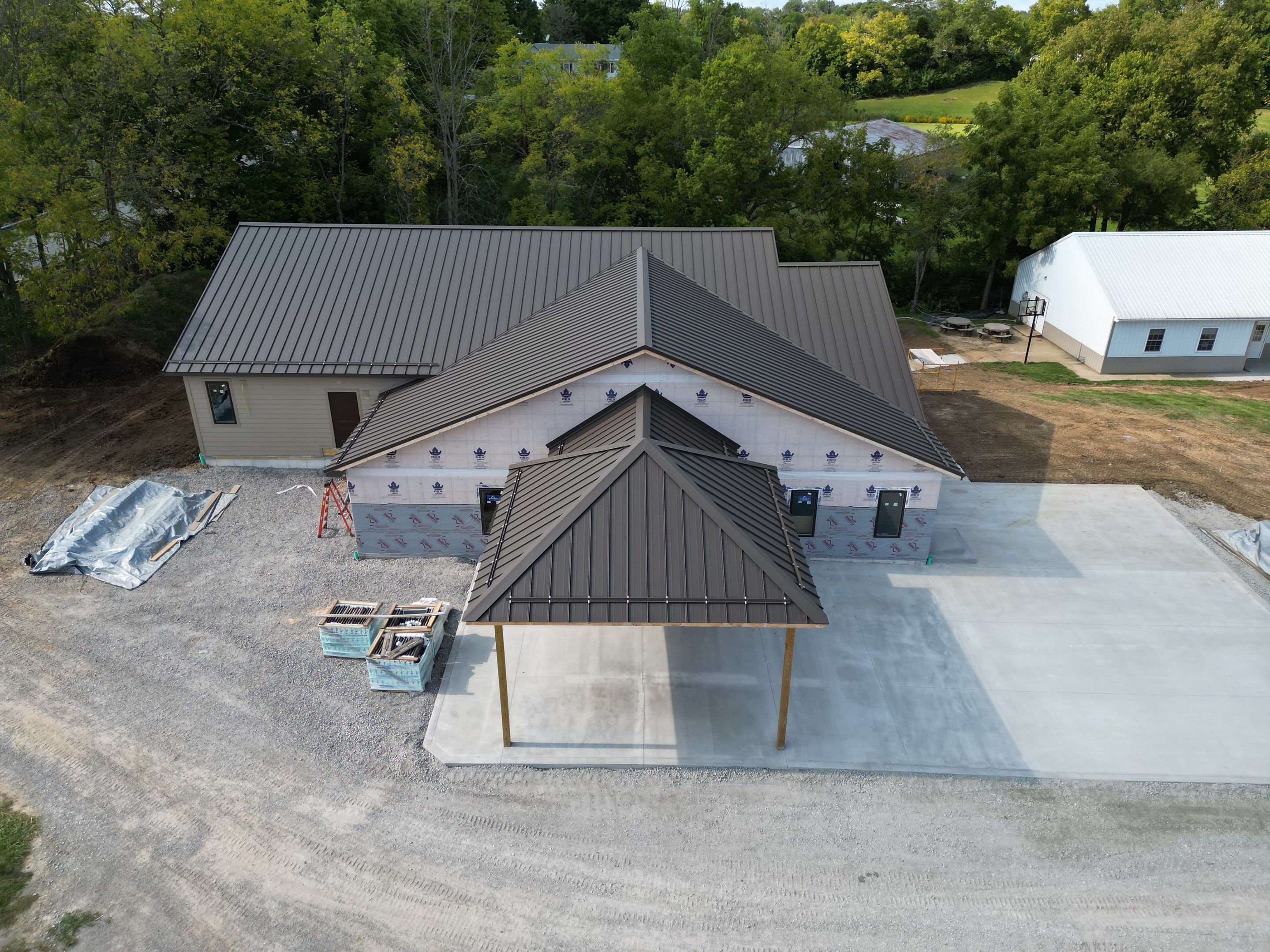 Commercial Roofing Installation using Standing Seam Metal - Burnished Slate Frost by RoofX 