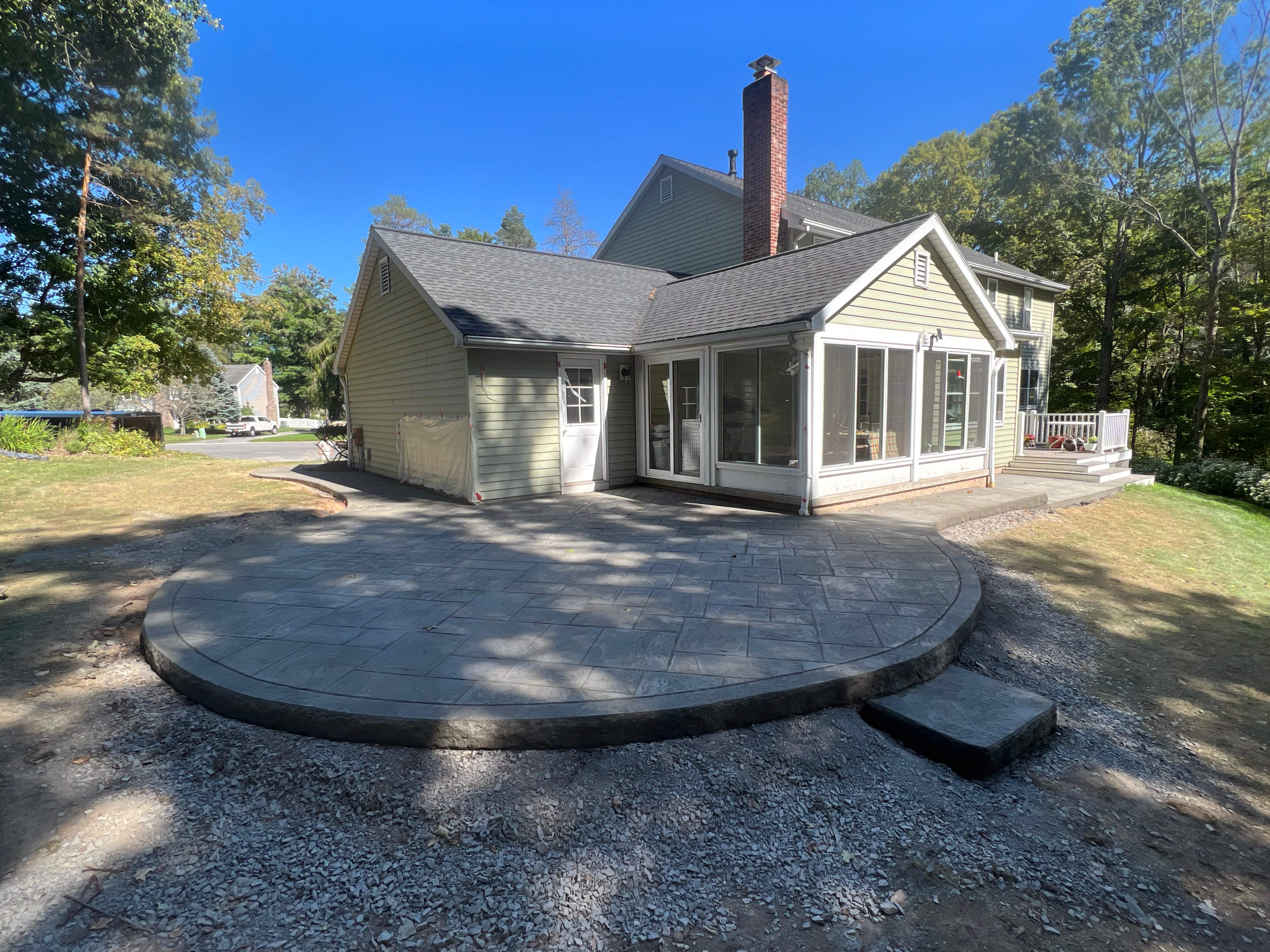 Majestic Ashlar stamped concrete patio by NG Masonry & Construction LLC
