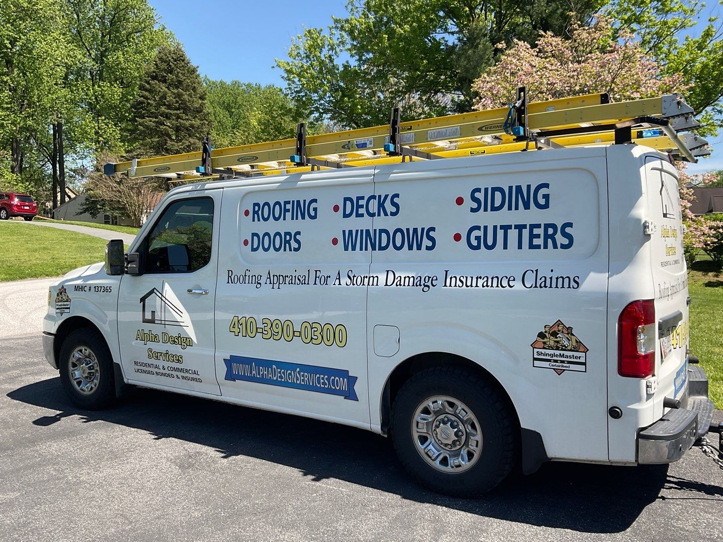 Residential Roofing Installation using Landmark Shingles Color Weatherwood by Alpha Design Services