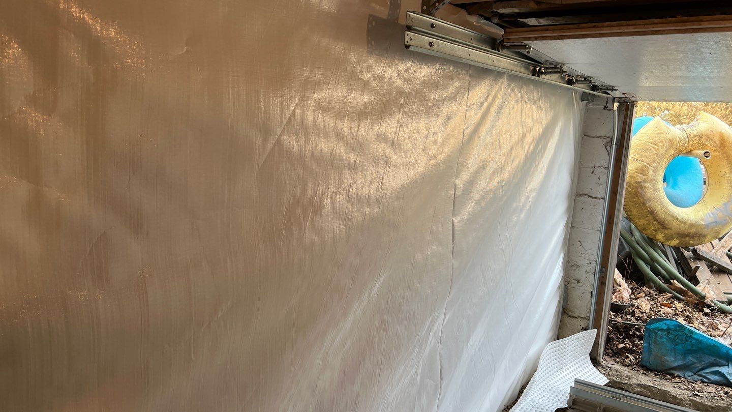 Basement Waterproofing using Drain tile system and a foundation wrap by ACE Waterproofing & Basement Solutions