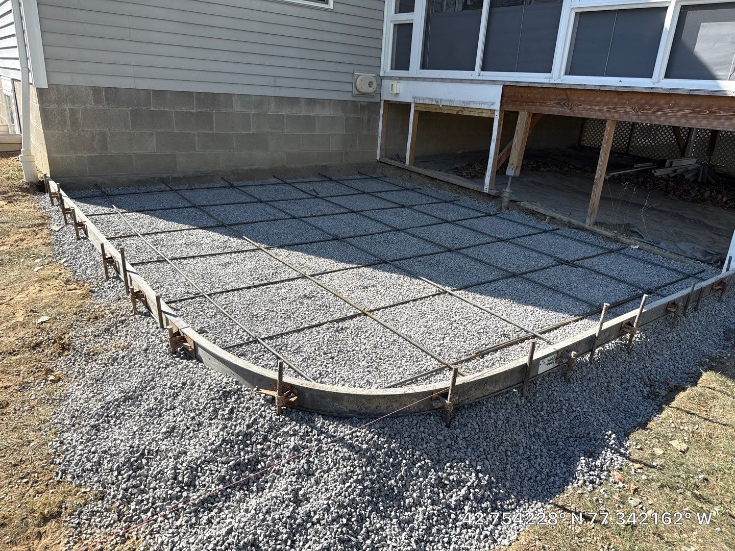 Stamped English Rivenstone concrete patio and sidewalks  by NG Masonry & Construction LLC