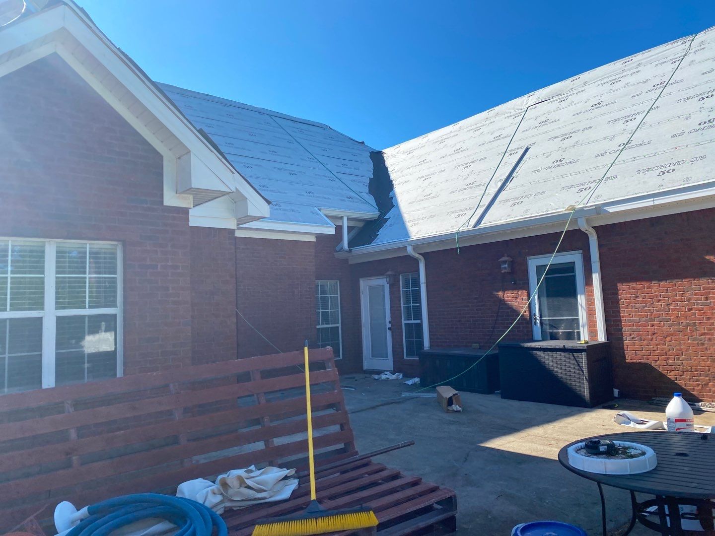 Residential Roofing Installation using Roof Replacement by American Roofing & Construction LLC
