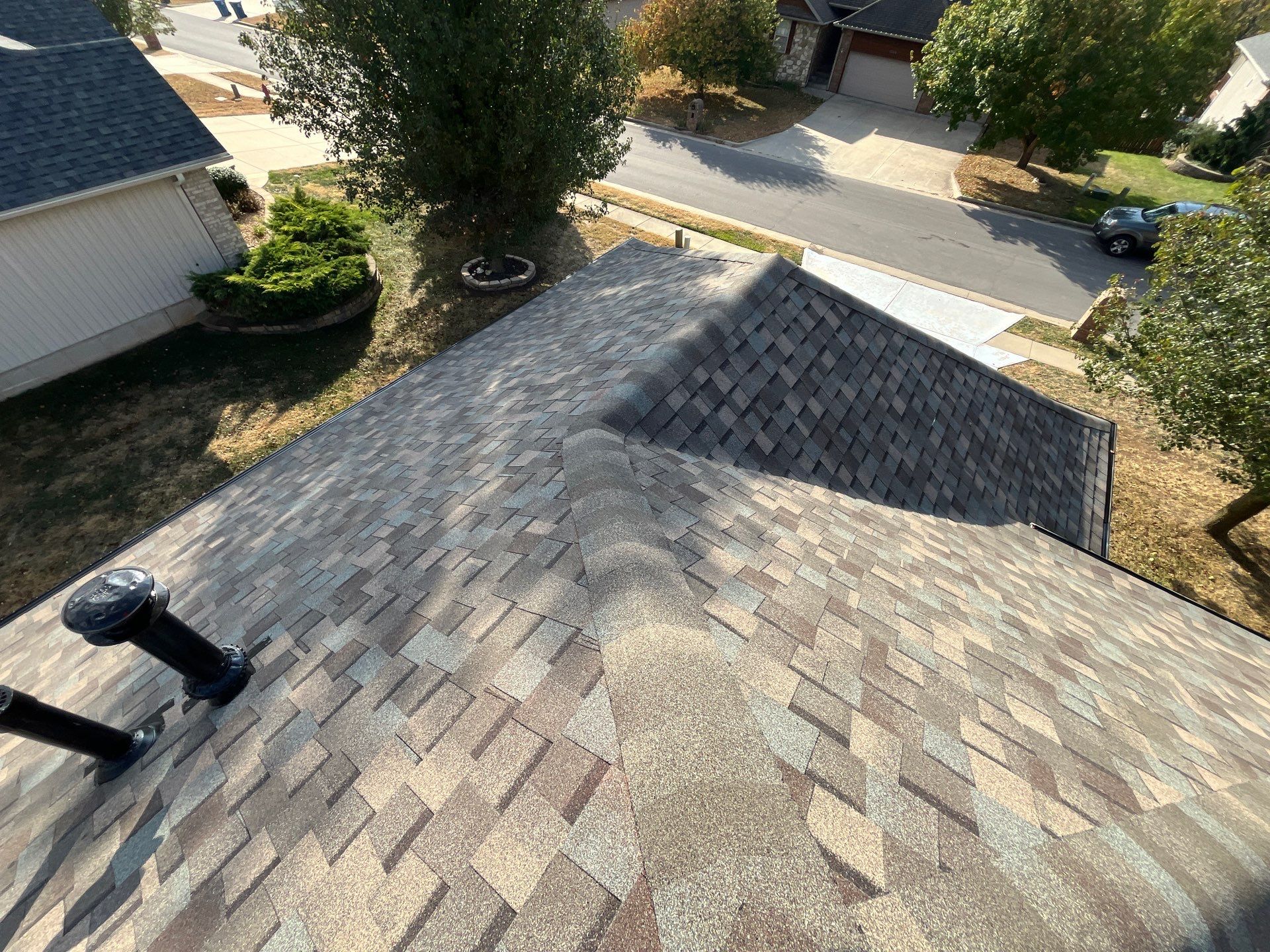 Residential Roofing + Downspouts & Gutter Guards Install  by Titan Commercial & Residential Roofing 