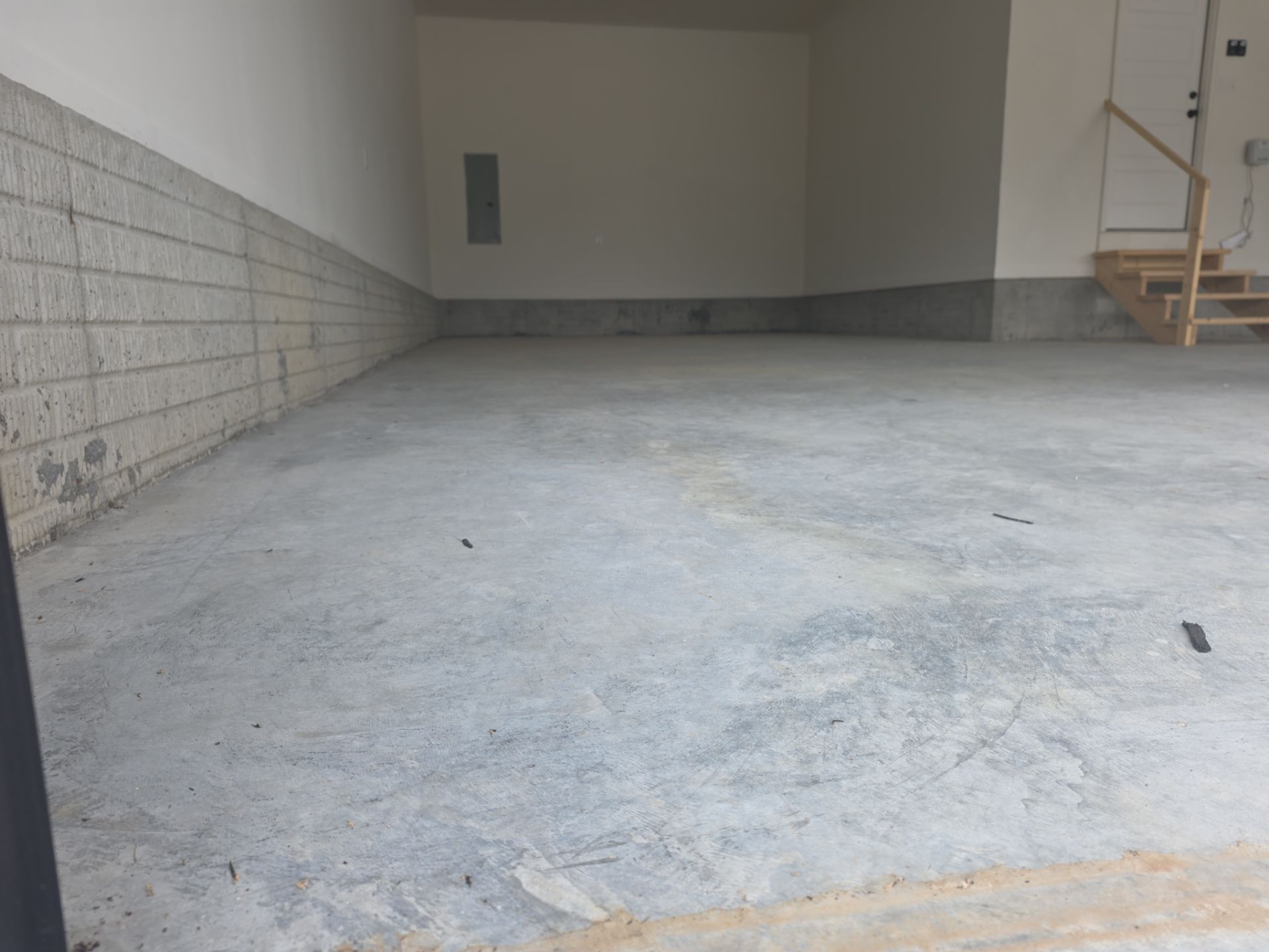 Husker-Style Garage by Revival Concrete Coatings