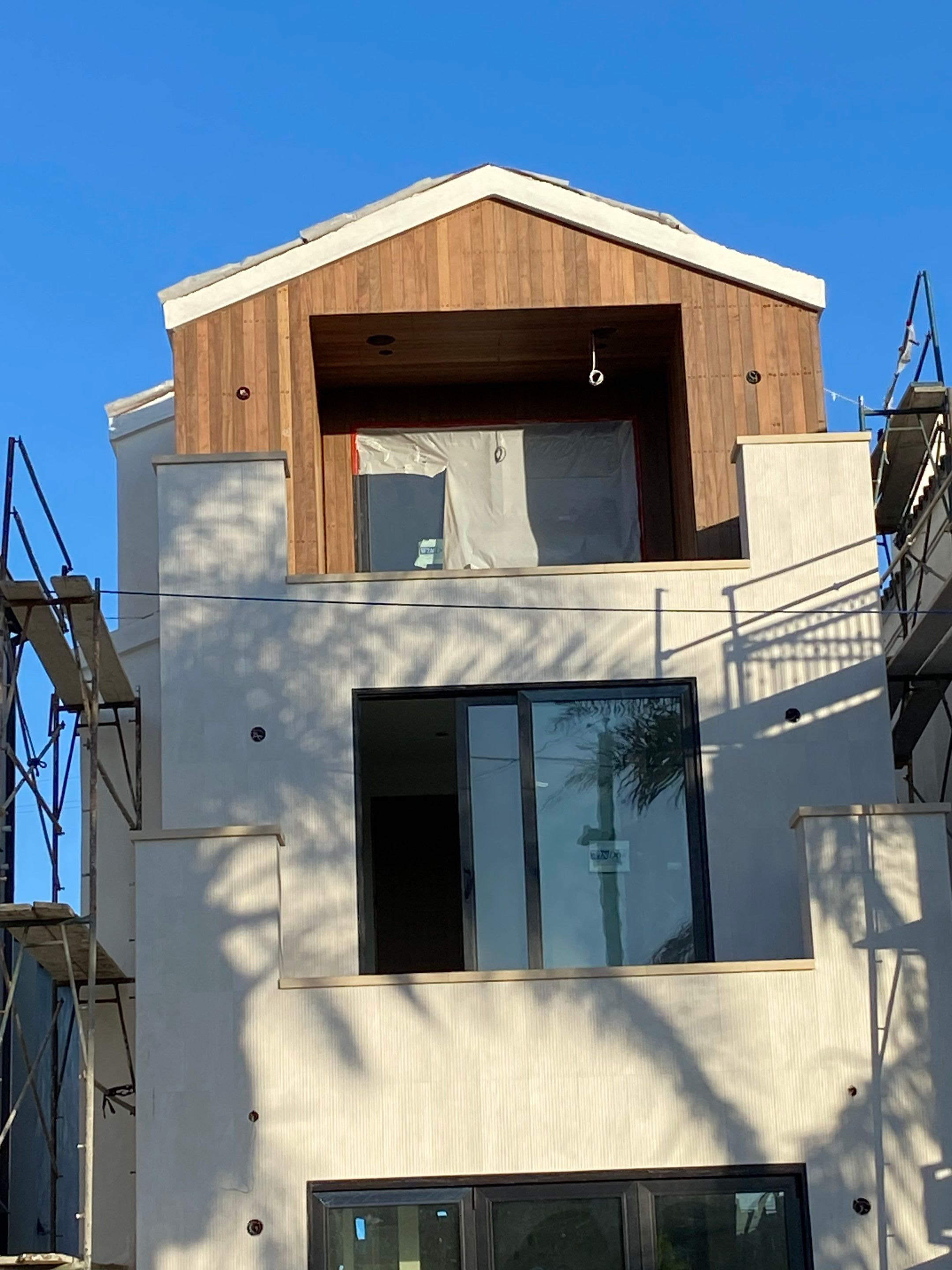 IPE vertical installation by New Era Siding Inc 