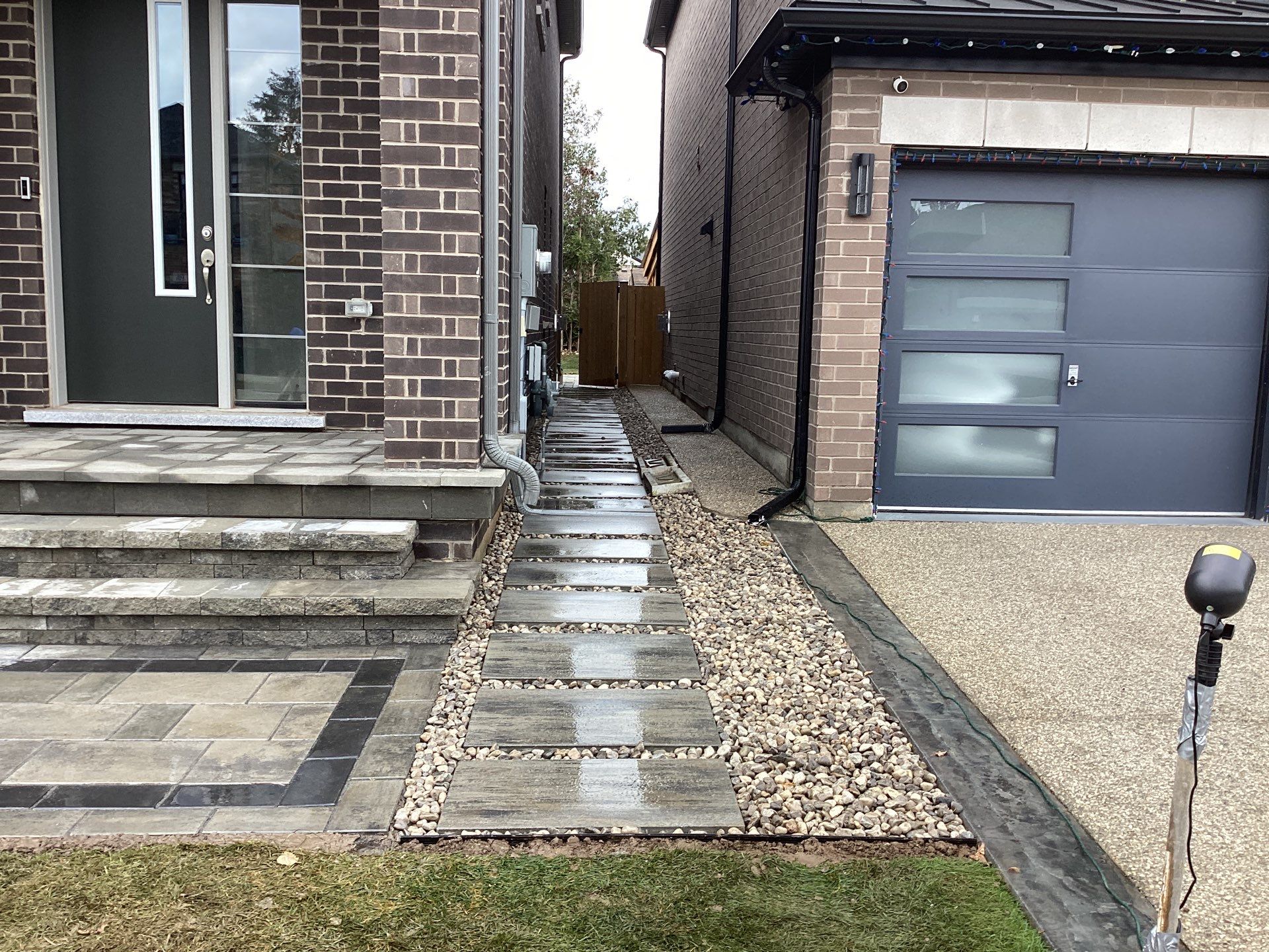 Front Entrance & Lounge Patio by Soares Landscaping
