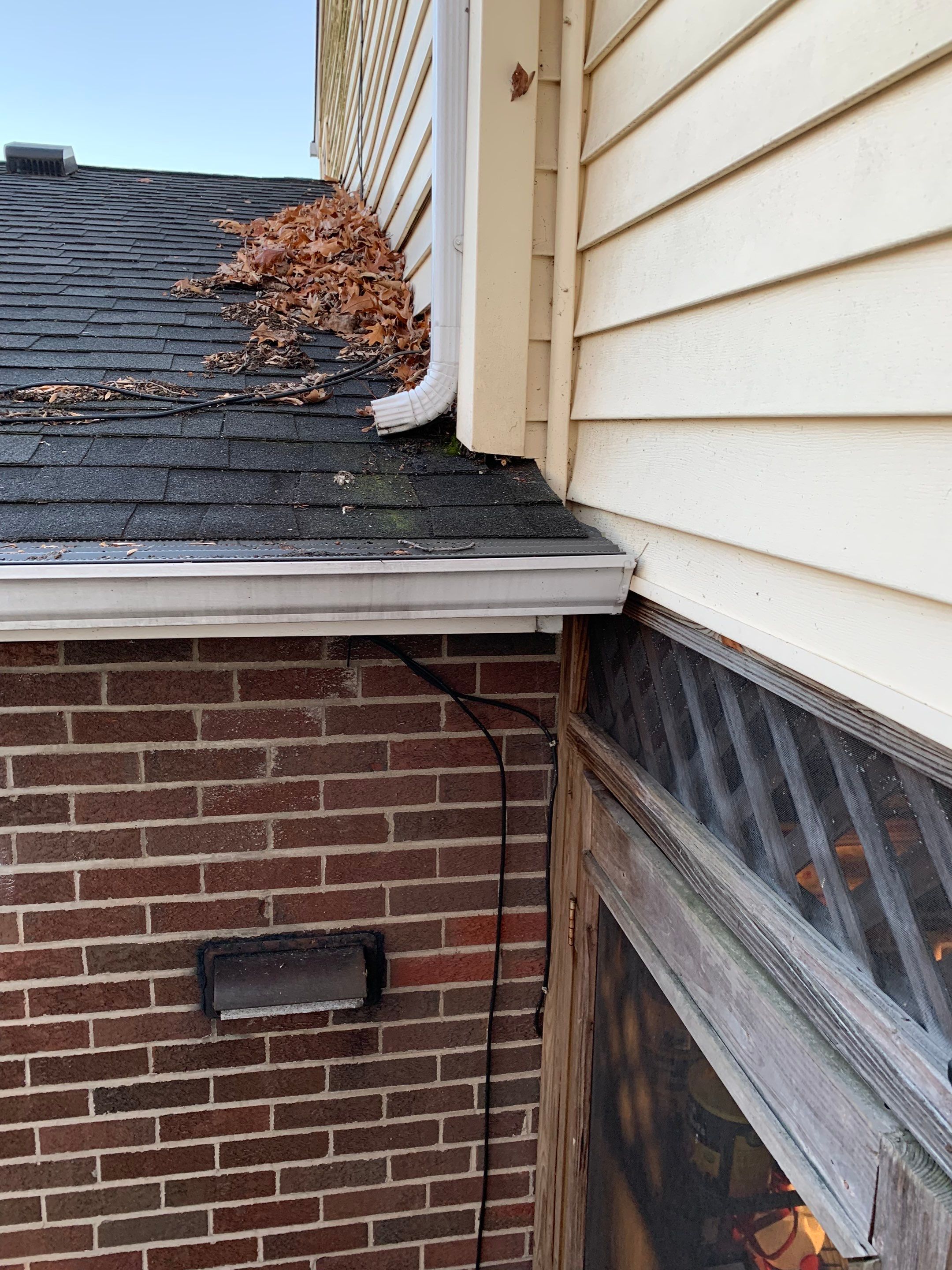 Replace dated vinyl siding with new white exterior Portfolio vinyl siding  by Secure Construction Company Inc