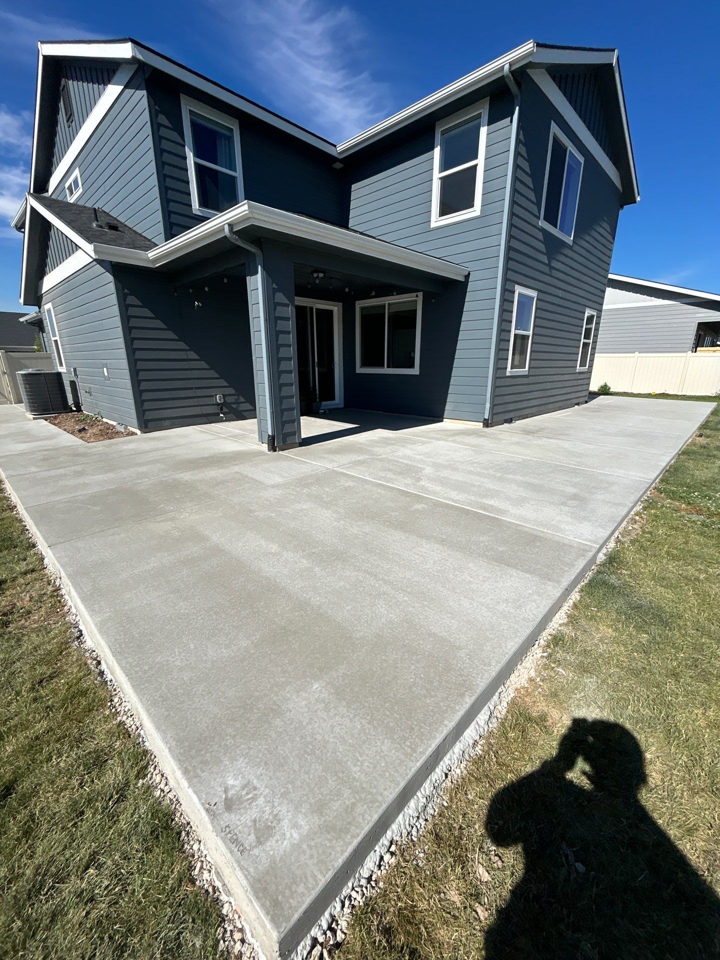 Patio Extension - Spanning to Driveway by Meridian Concrete | Meridian Curbing & Landscape