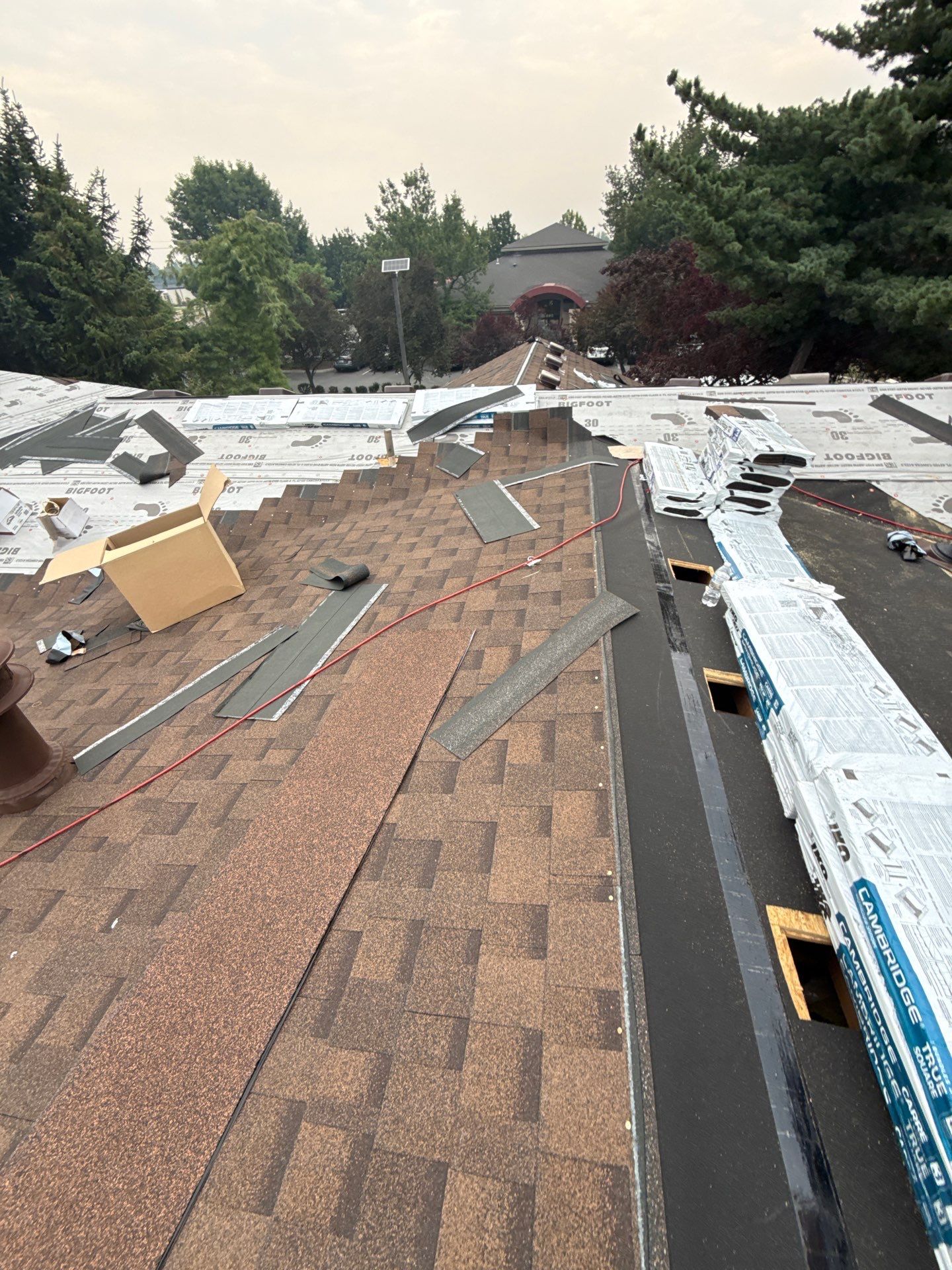 Boise Commercial Roof Replacement with Brown Architectural Shingles by Olive Roofing