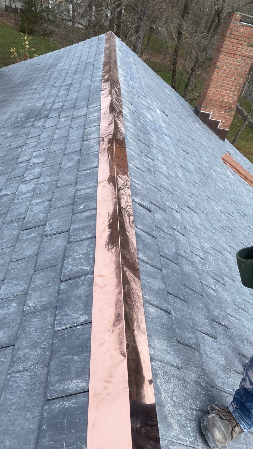 Residential Roofing Installation using Vermont Slate by A Plus Exterior