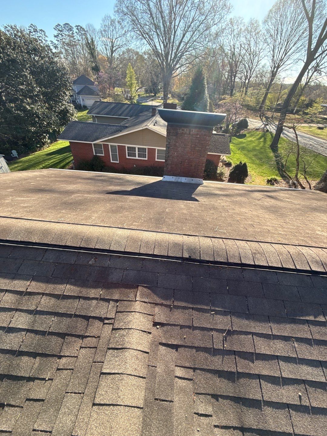 Residential Roof Replacement using TAMKO Titan XT Rustic Black by RISE Roofing & Restoration, LLC