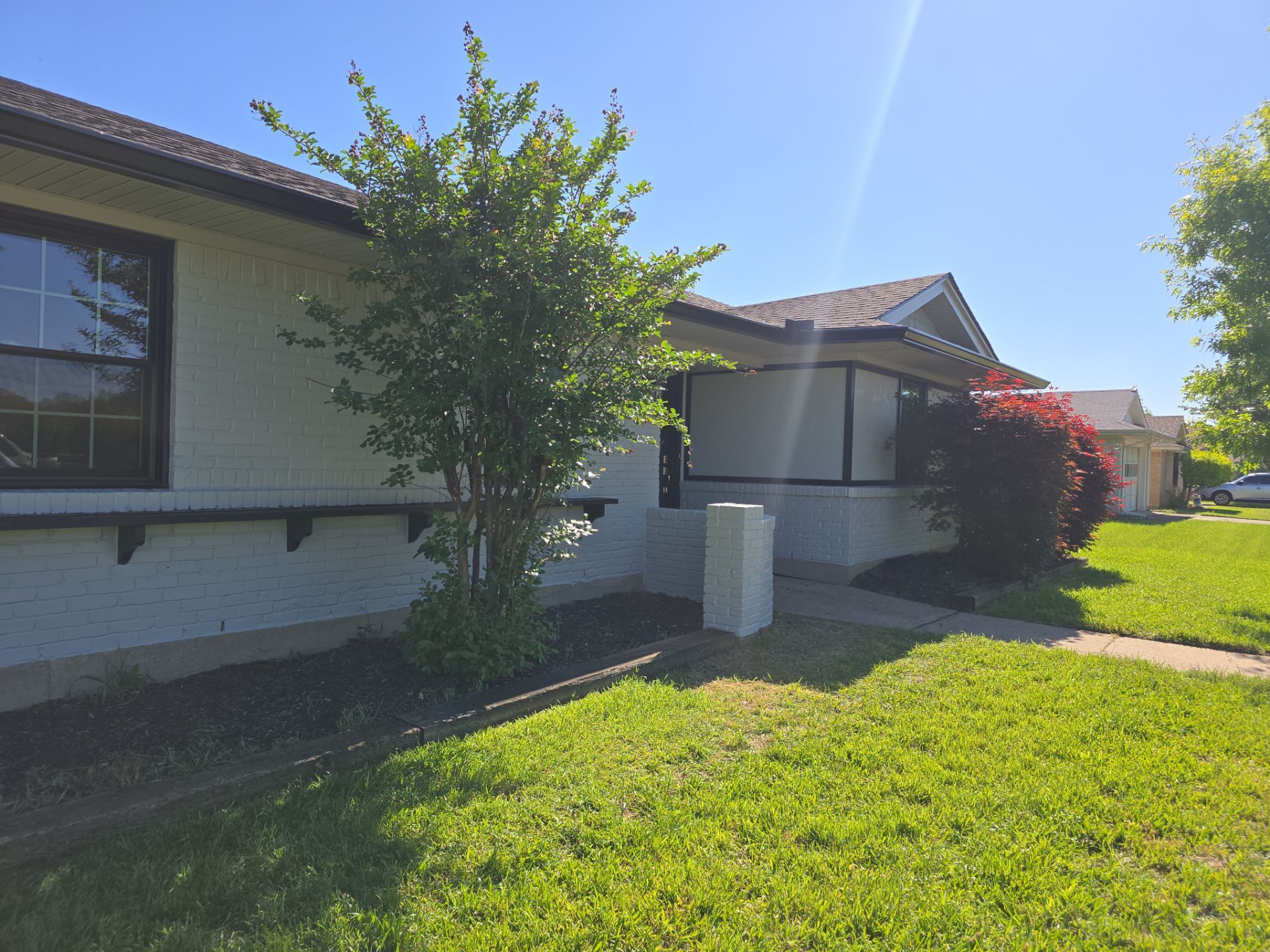 Exterior Home Paint Project with Different Surfaces by SLM General Contractors & Roofing