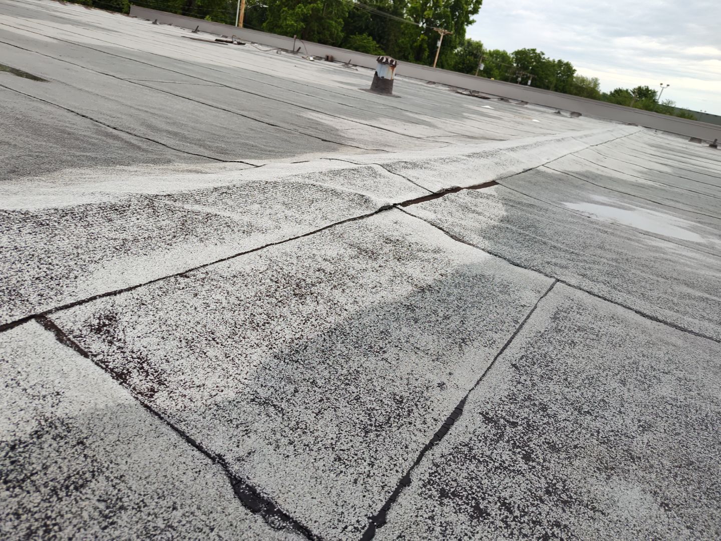 Commercial Roofing Install - SPF Foam & Coatings Restoration System - Color White  by Titan Commercial & Residential Roofing 