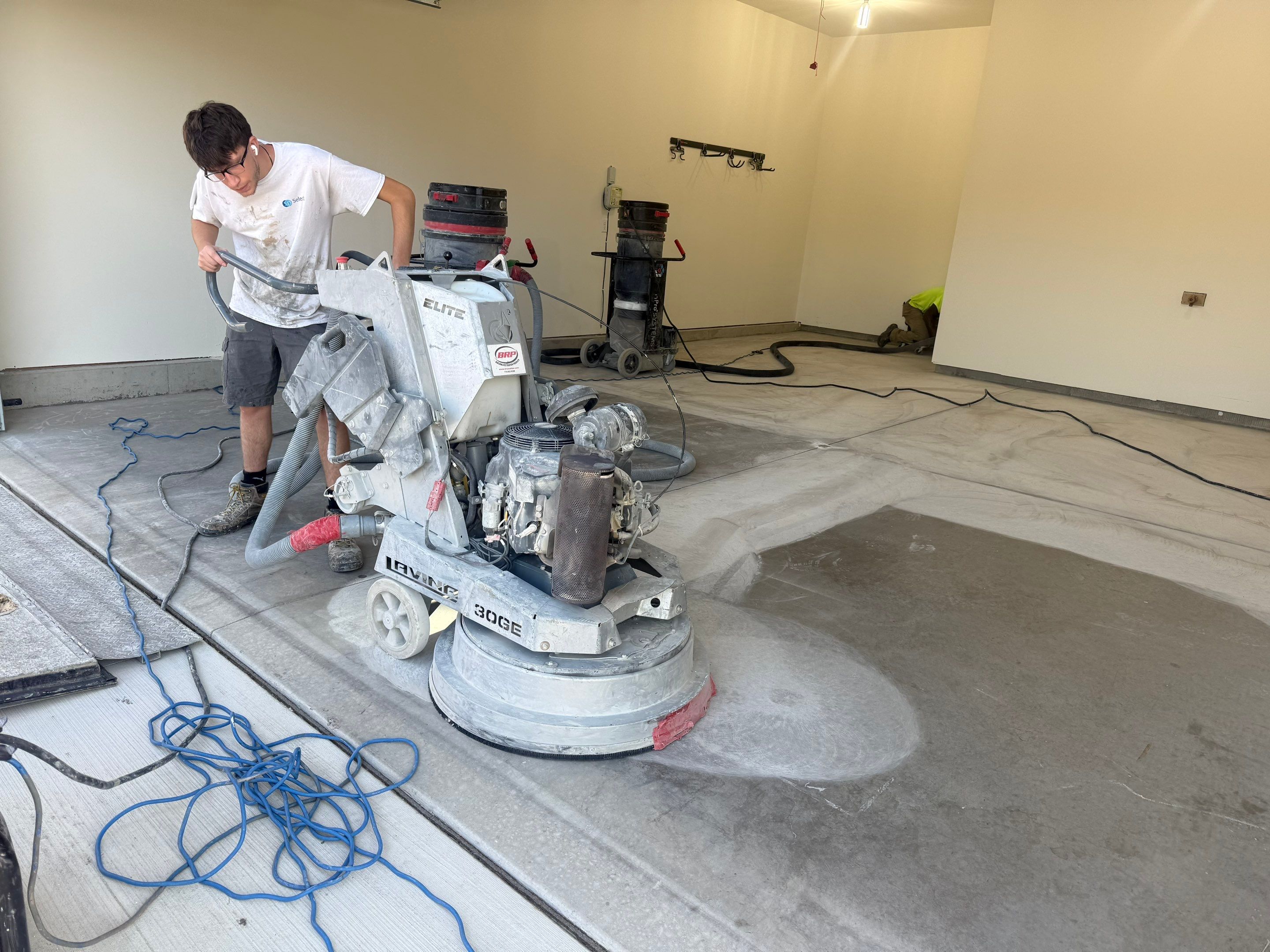 Cabin Fever Garage Floor Coating in Sioux Falls by Select Painting, Coatings & Garage Cabinets