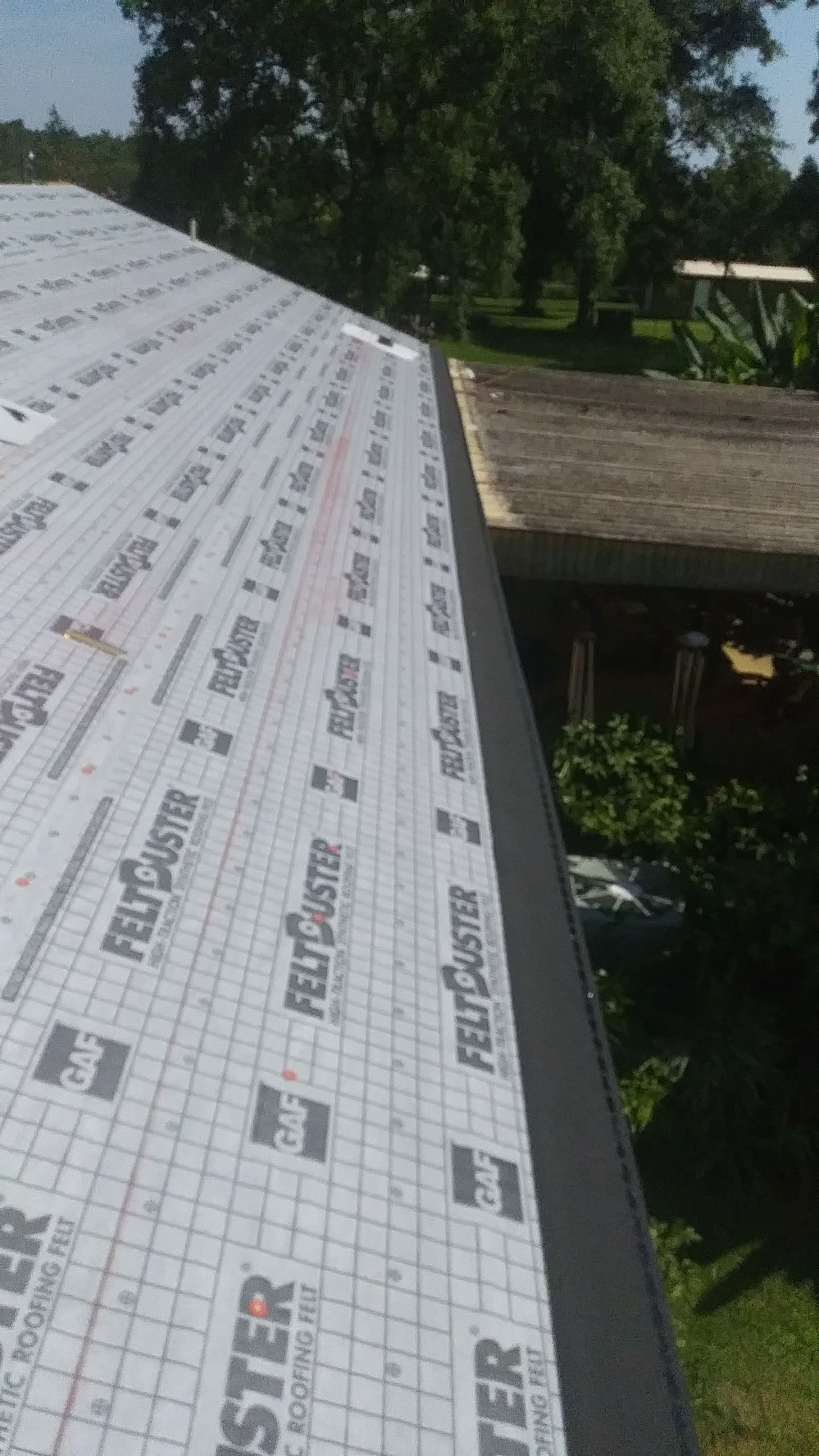 Residential Roofing Installation using Roof Replacement by American Roofing & Construction LLC