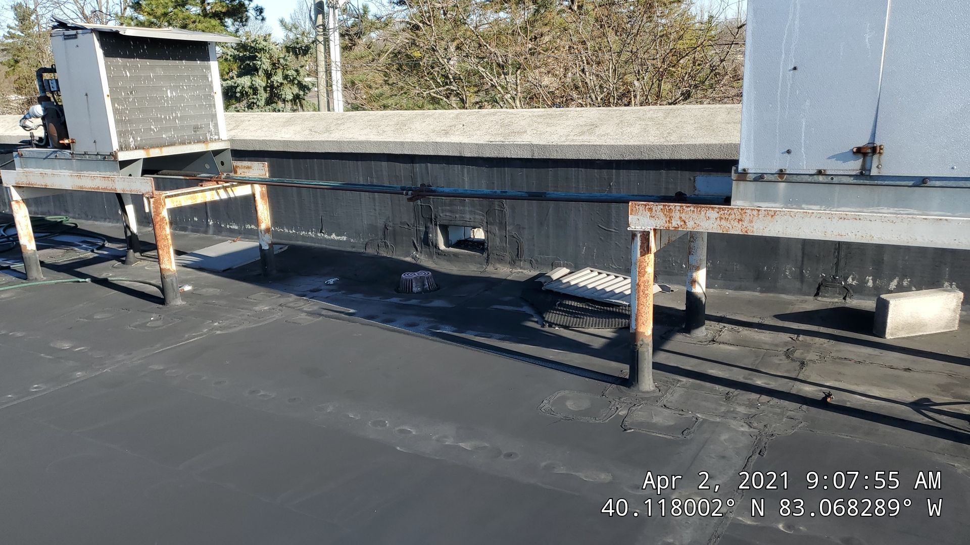Fabric Reinforced Roof Coating by Gold Star Roofing LLC 