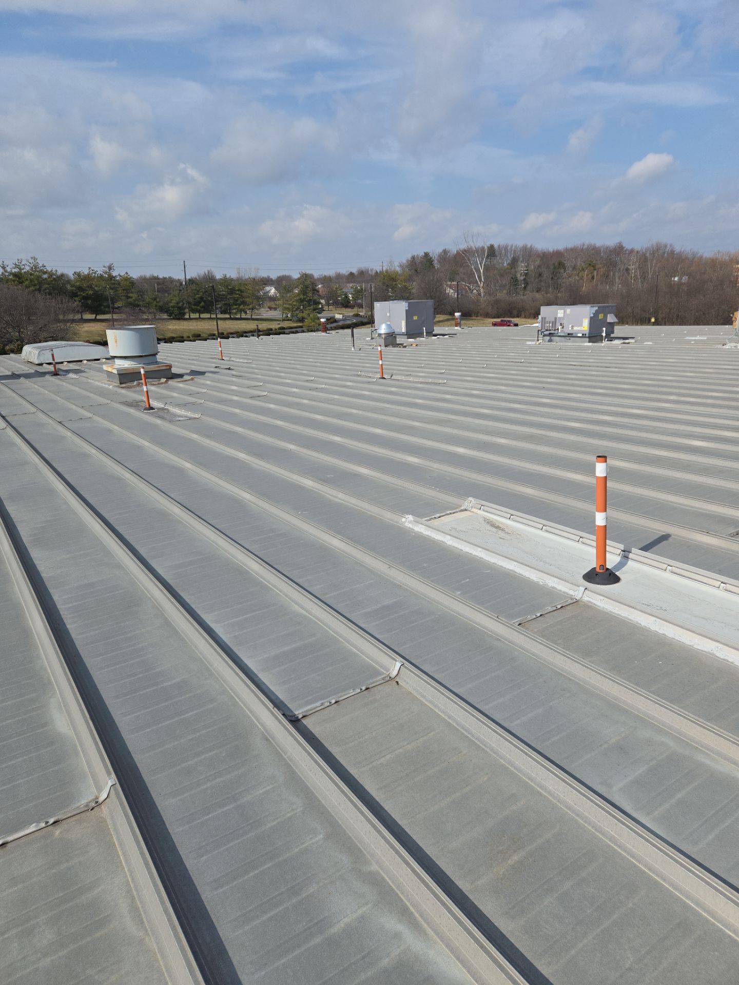 Commercial Metal and Flat Roof Repairs in Mason, Ohio by Level Up Roofing and Restoration Services LLC