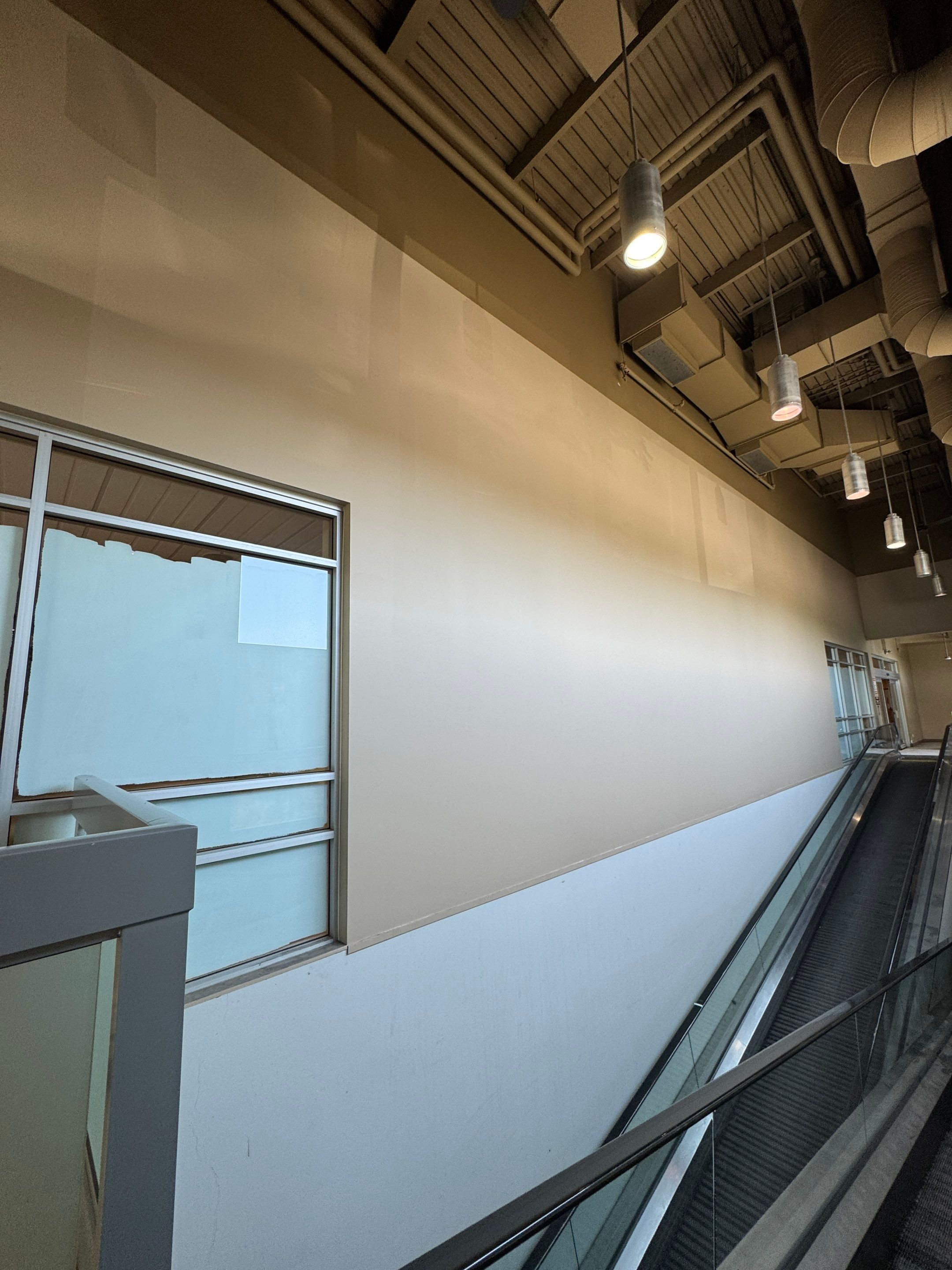 Commercial Prime & Paint Project-30ft height by YVR Construction Group