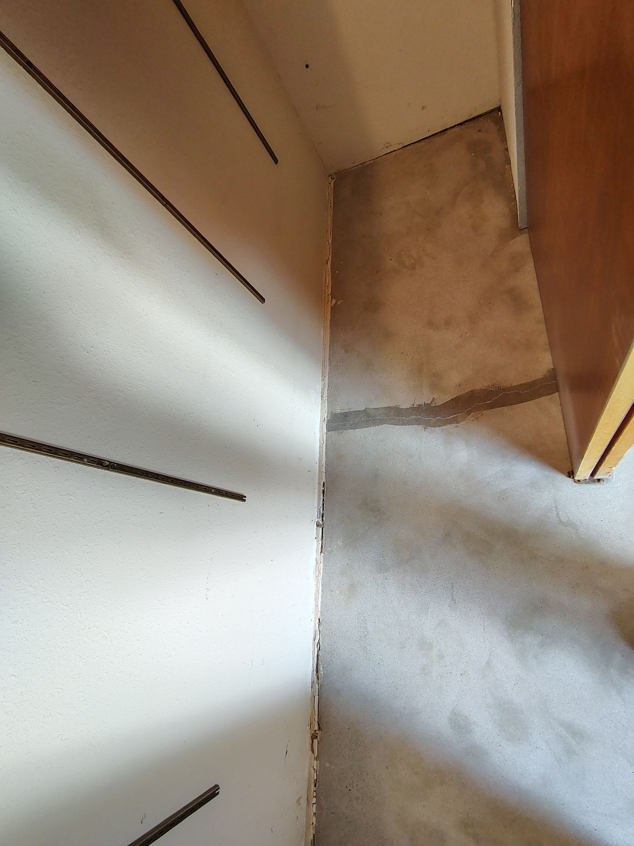 Domino Flake Garage Floor Coating Installation in Sioux Falls by Select Painting, Coatings & Garage Cabinets