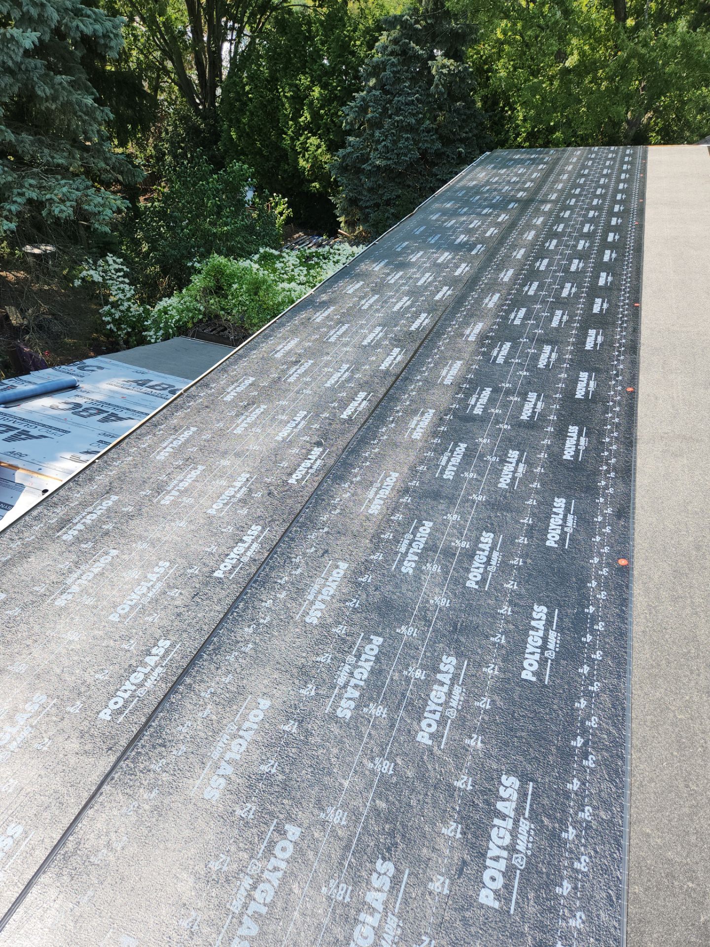 Residential Roof Replacement using Owens Corning Duration Driftwood by Absolute Roofing and Construction