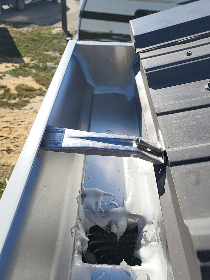 Gutter Installation using K-Style White Seamless Gutters by Gutter Professors