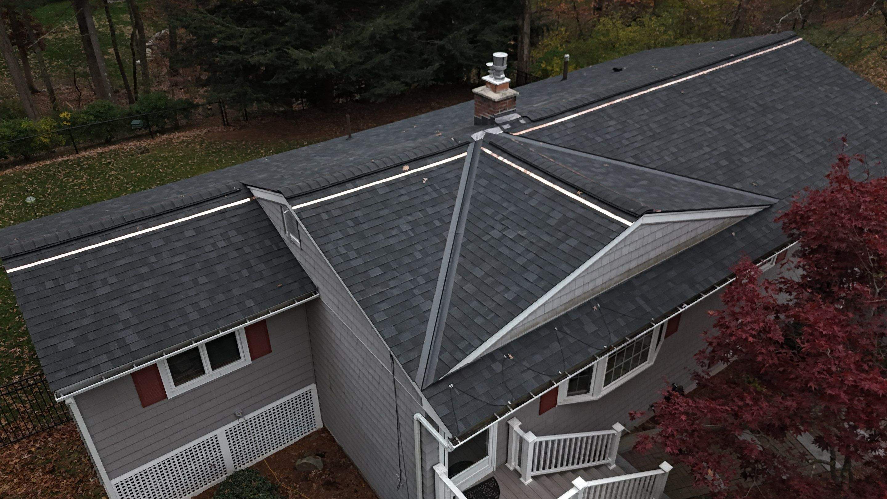 Chelmsford Complete Roof Replacement in Onyx Black with Balanced Ventilation by Mighty Dog Roofing of Greater Middlesex County