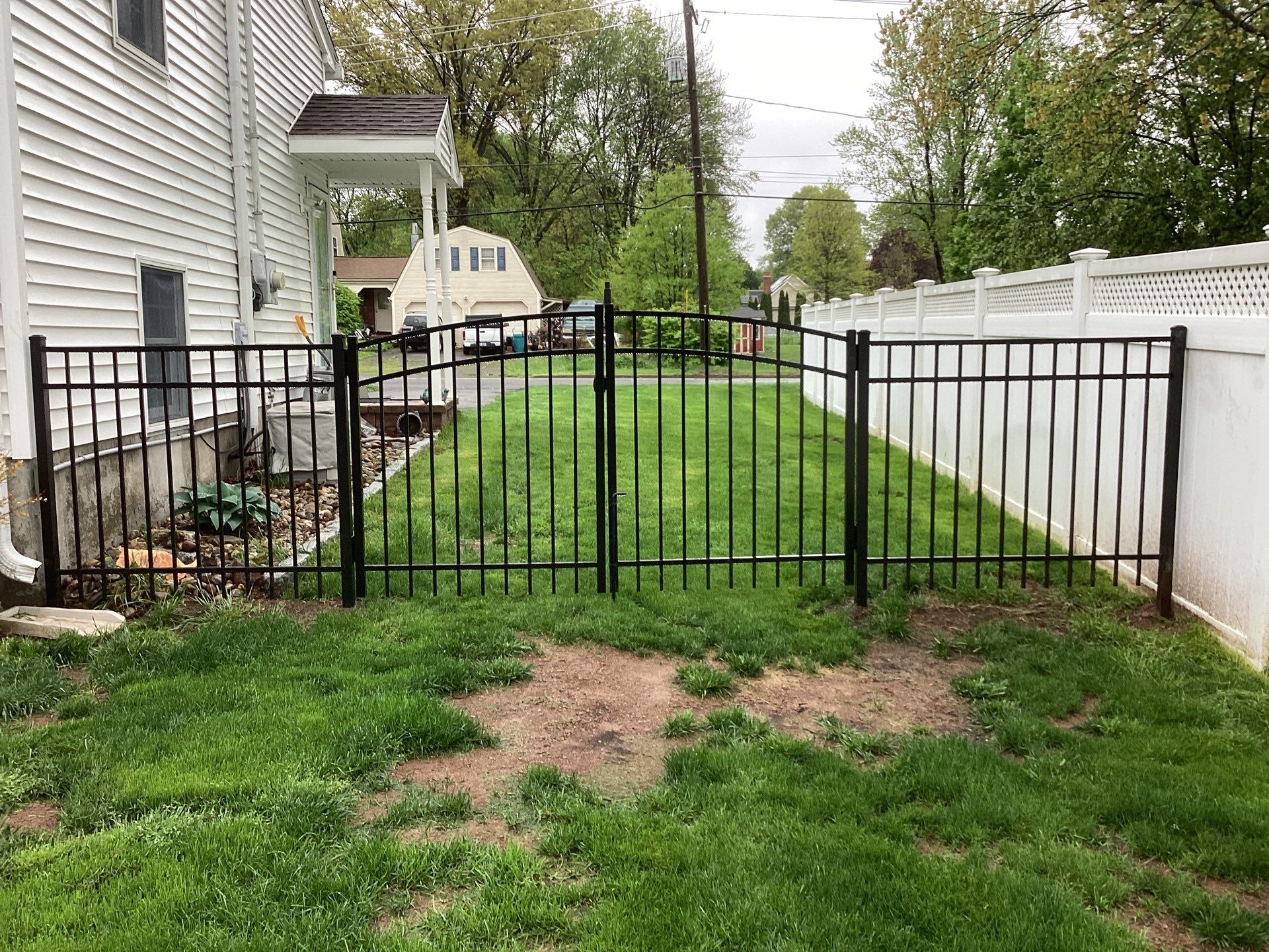 New Black Aluminum Fence and matching Gates by DiGiorgi Roofing and Siding Inc