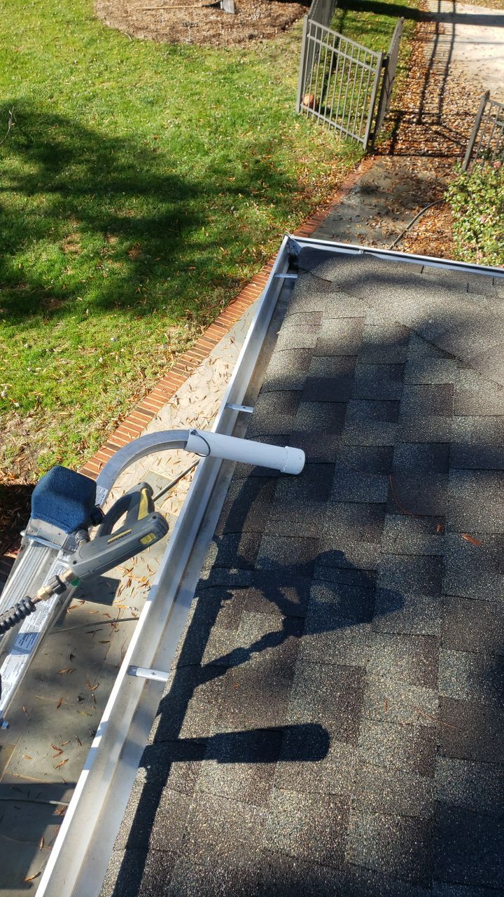 Sara Gutter cleanout using water by G&H Home Tech Pros LLC
