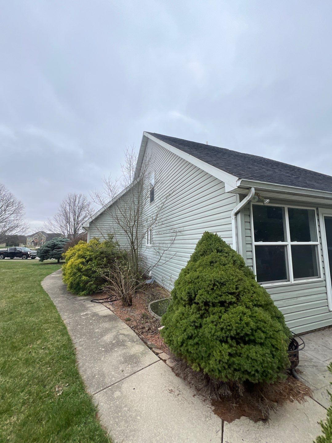 Exterior Installation using Onyx Black Durations and White Siding by WIW Enterprises Inc