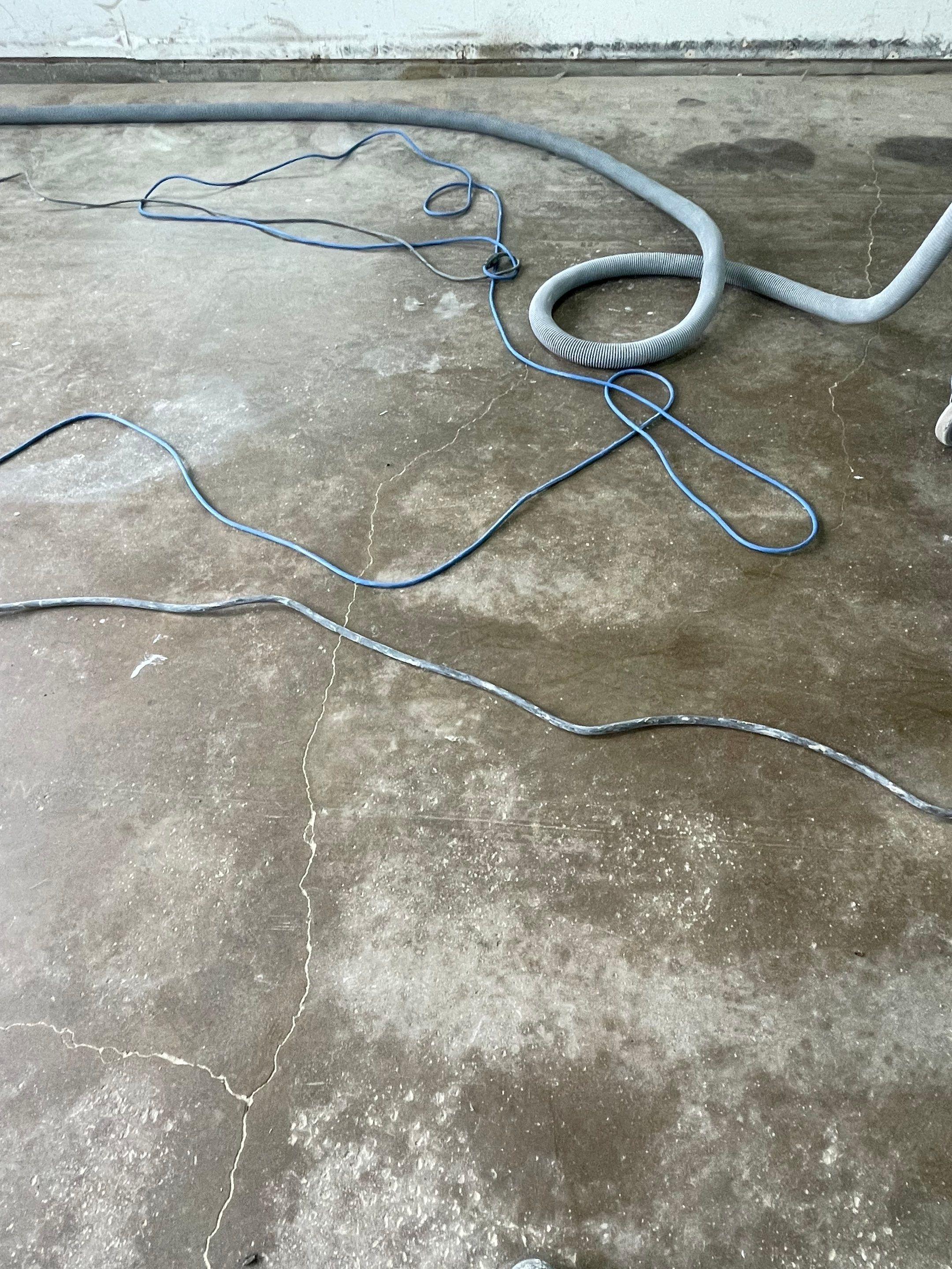Coyote Flake Concrete Coating for Sioux Falls Garage by Select Painting, Coatings & Garage Cabinets