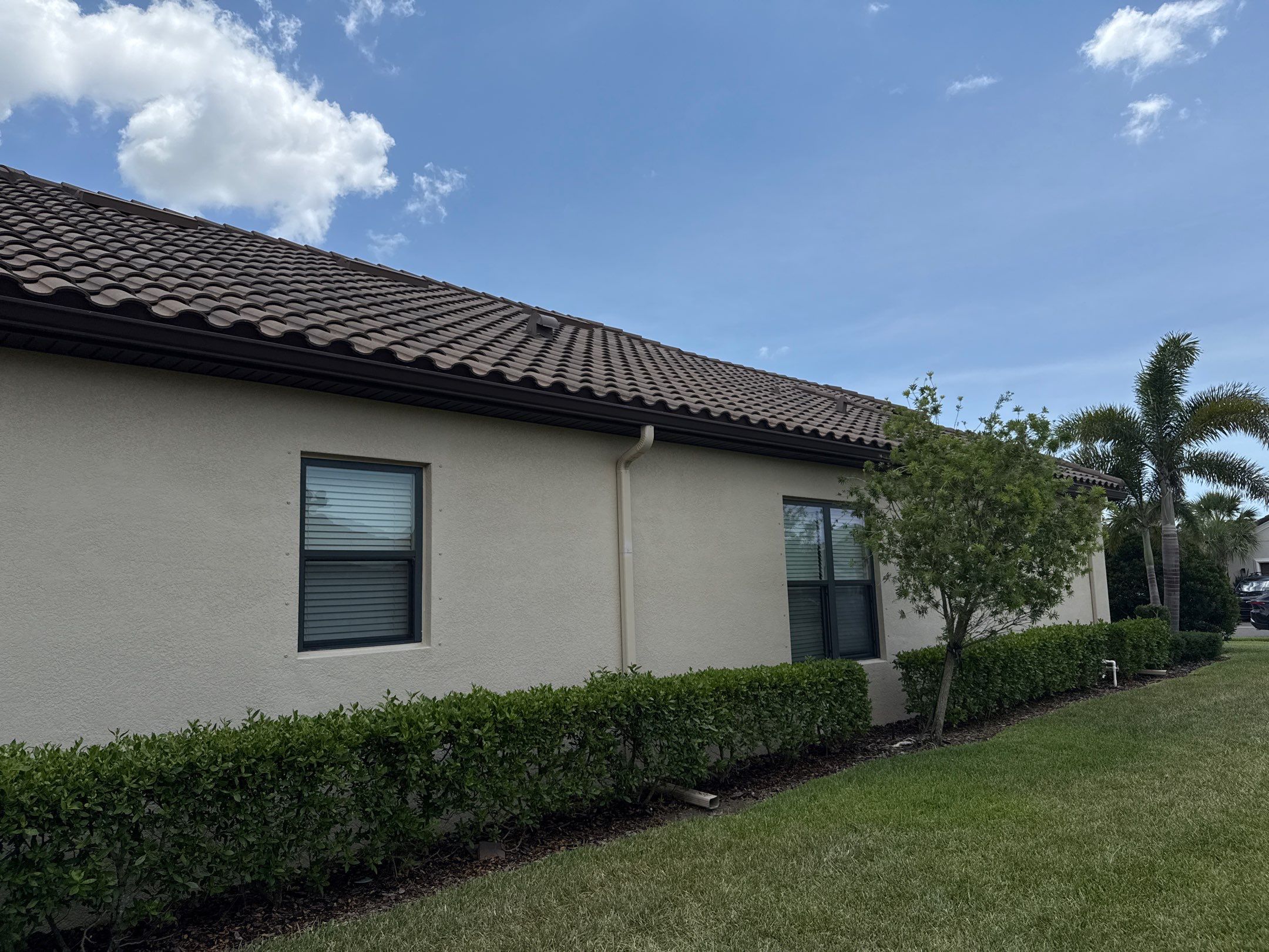 Concrete Tile Roof, Paver Driveway & Lanai Cleaning – Artisan Lakes Esplanade, Palmetto, FL by Sunshine AquaWash