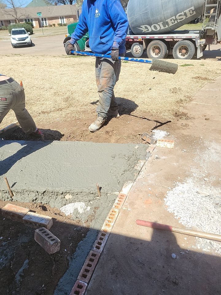 Concrete sidewalk using Concrete by Clays Services Inc