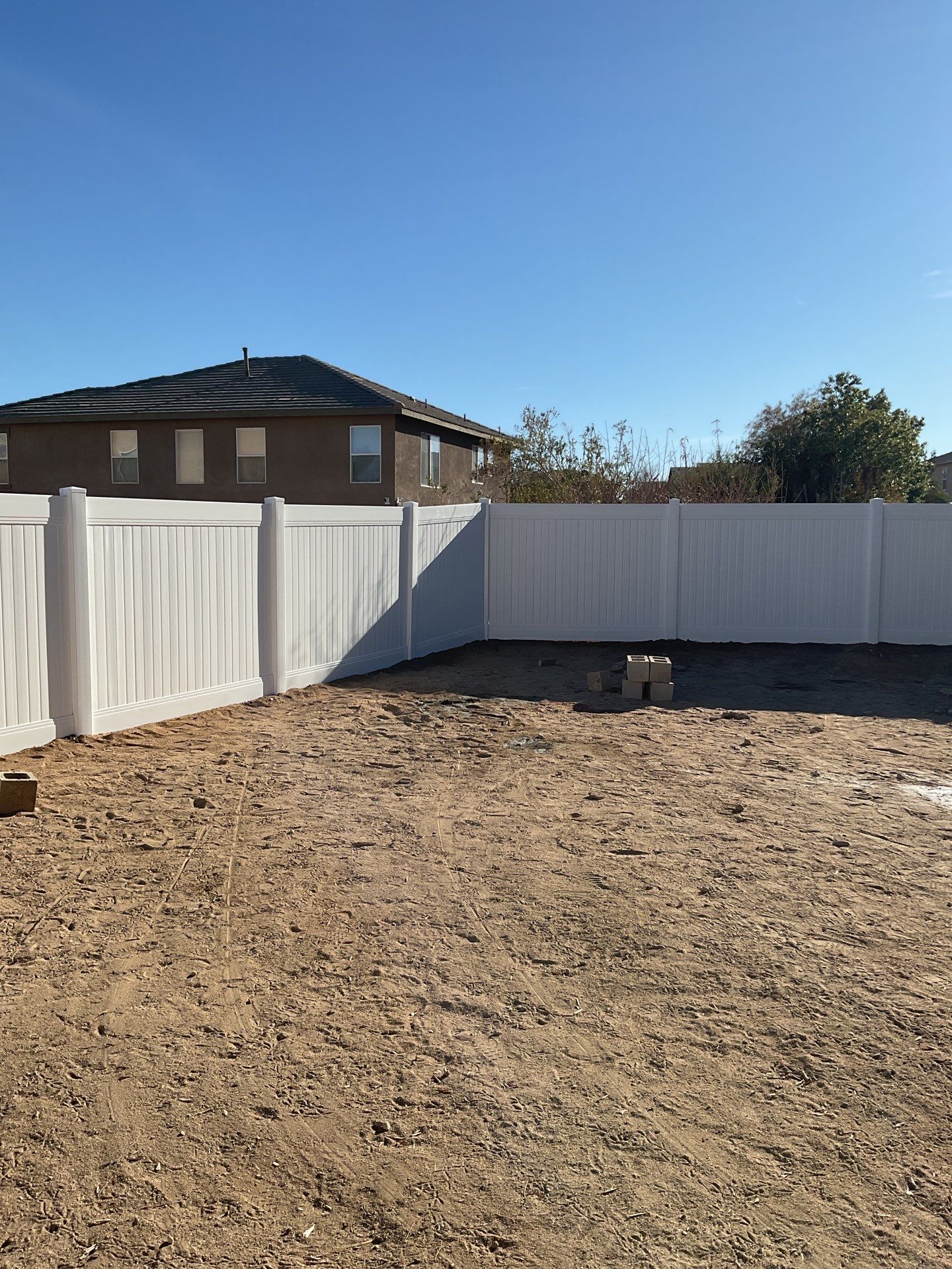 Fence installation using wood by Fence Guys Inc.