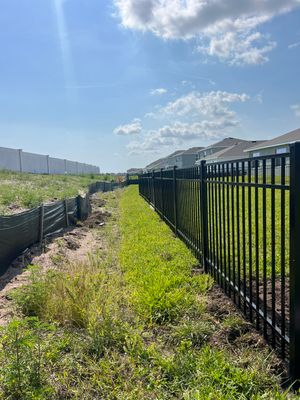 Aluminum Fence Installation using Black 3 Rail Aluminum Fence