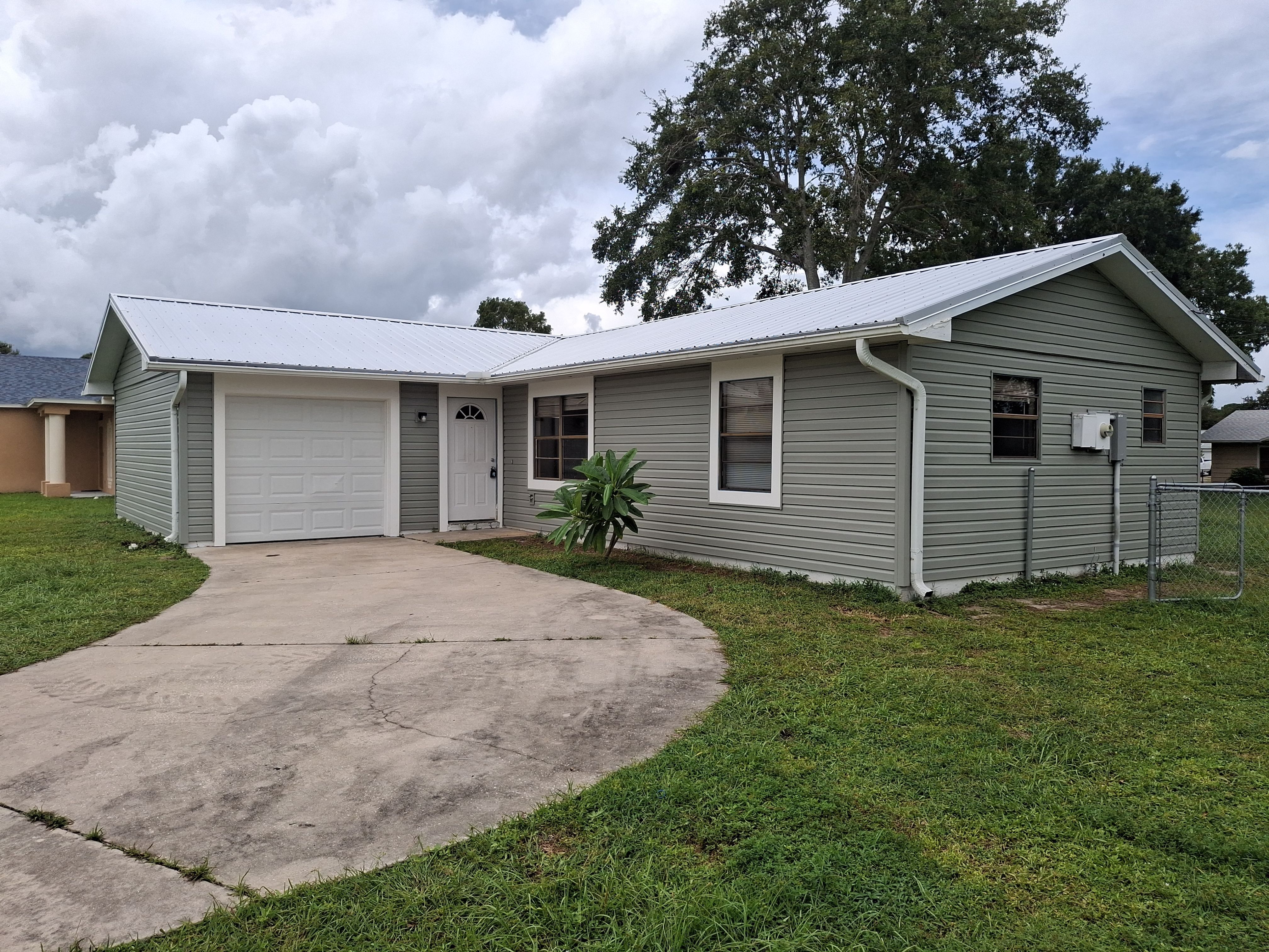 Vinyl Siding Installation and Structural Wood Rot Repair in Palm Bay by Florida Roofing and Renovations Inc.