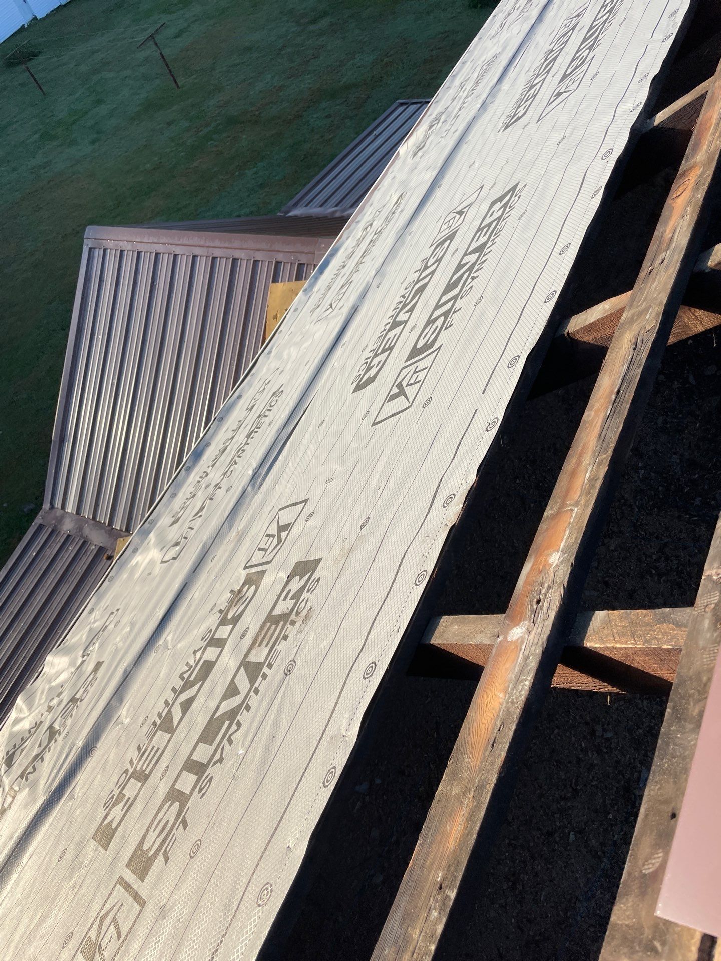 Residential Roofing Installation using Metal by Rainstoppers Roofing