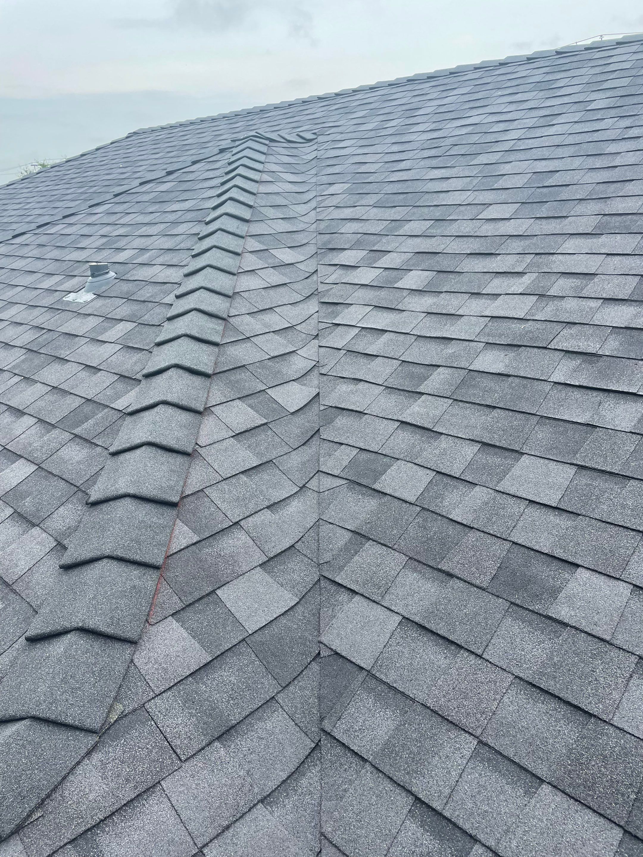 Residential Roofing Installation using CertainTeed Landmark MaxDef Moire Black by OneSource Roofing and Restoration