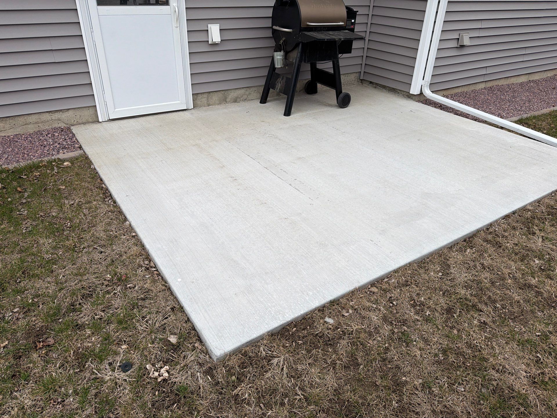 Speckled Epoxy Concrete Coating for Edgerton Garage Floor by Select Painting, Coatings & Garage Cabinets