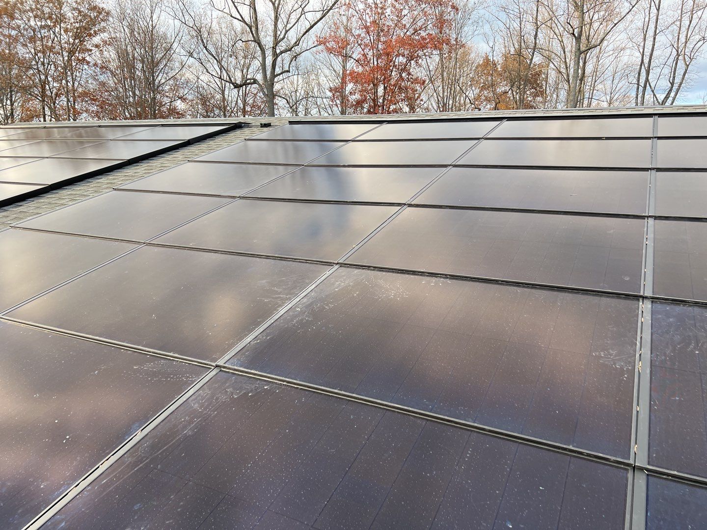 Solar Roof using GAF Decotech integrated panels by American Home Contractors