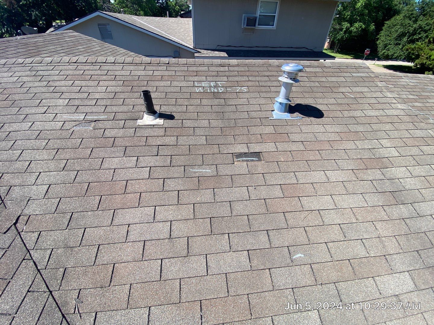 Roof inspection in Bartlesville by Decor Roofing & Restoration