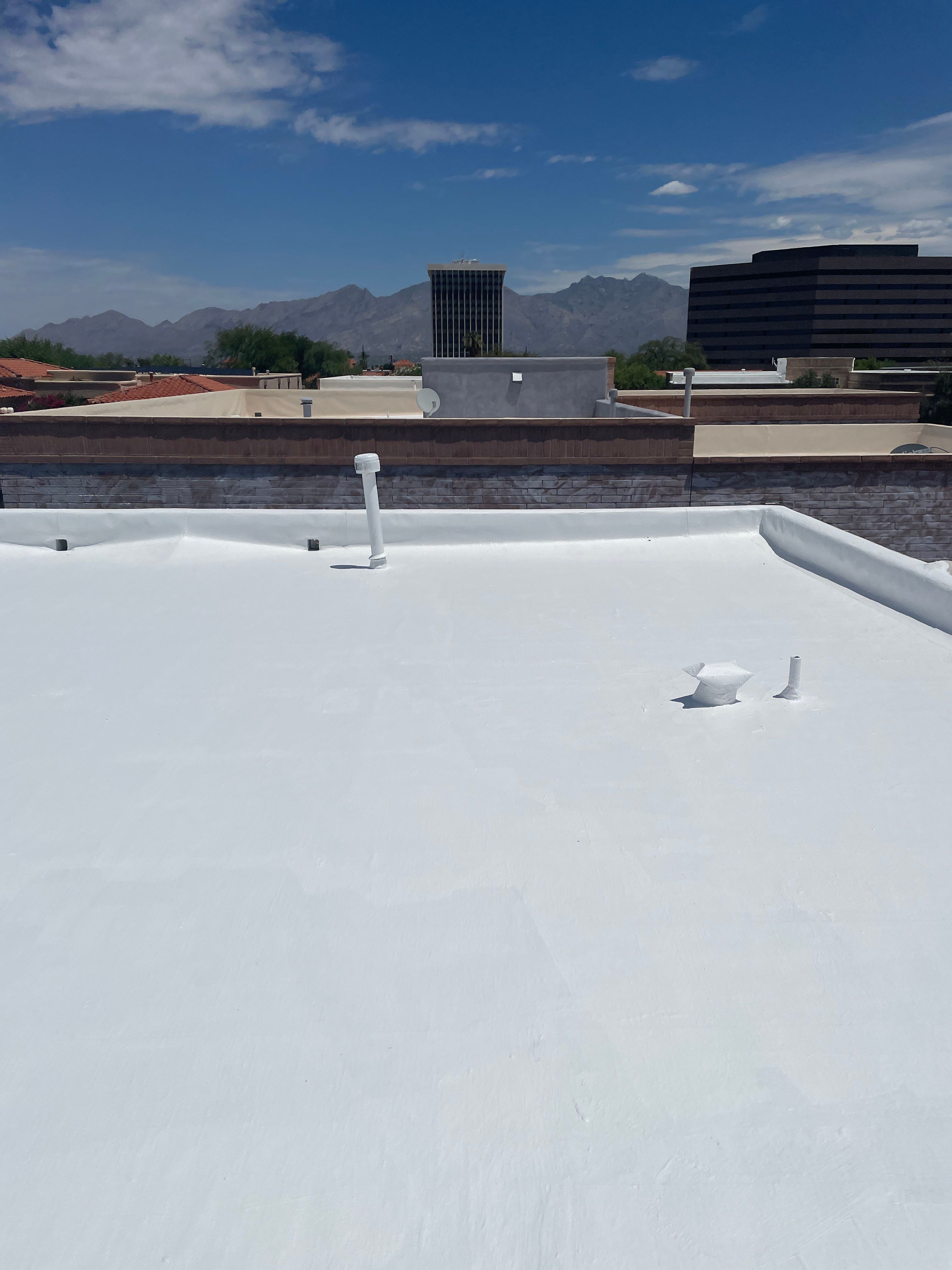 Tucson Residential Roof Restoration with Tile and Elastomeric Coating by West Coast Roofing AZ