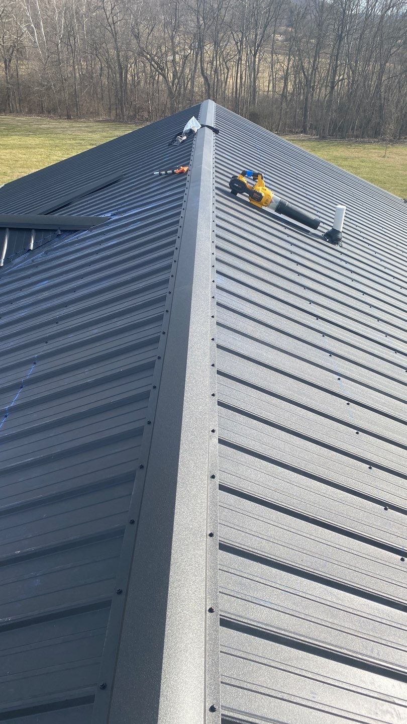 Residential Roofing Installation using Performance Panel Metal - Frost Black by RoofX 