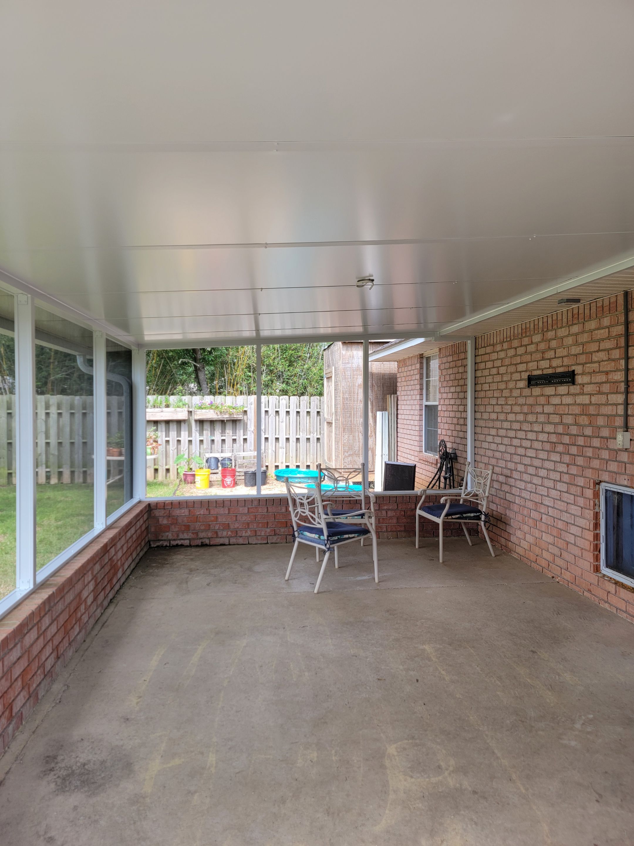 Screen Room in Milton w/Brick Kneewall by Titan Sunrooms