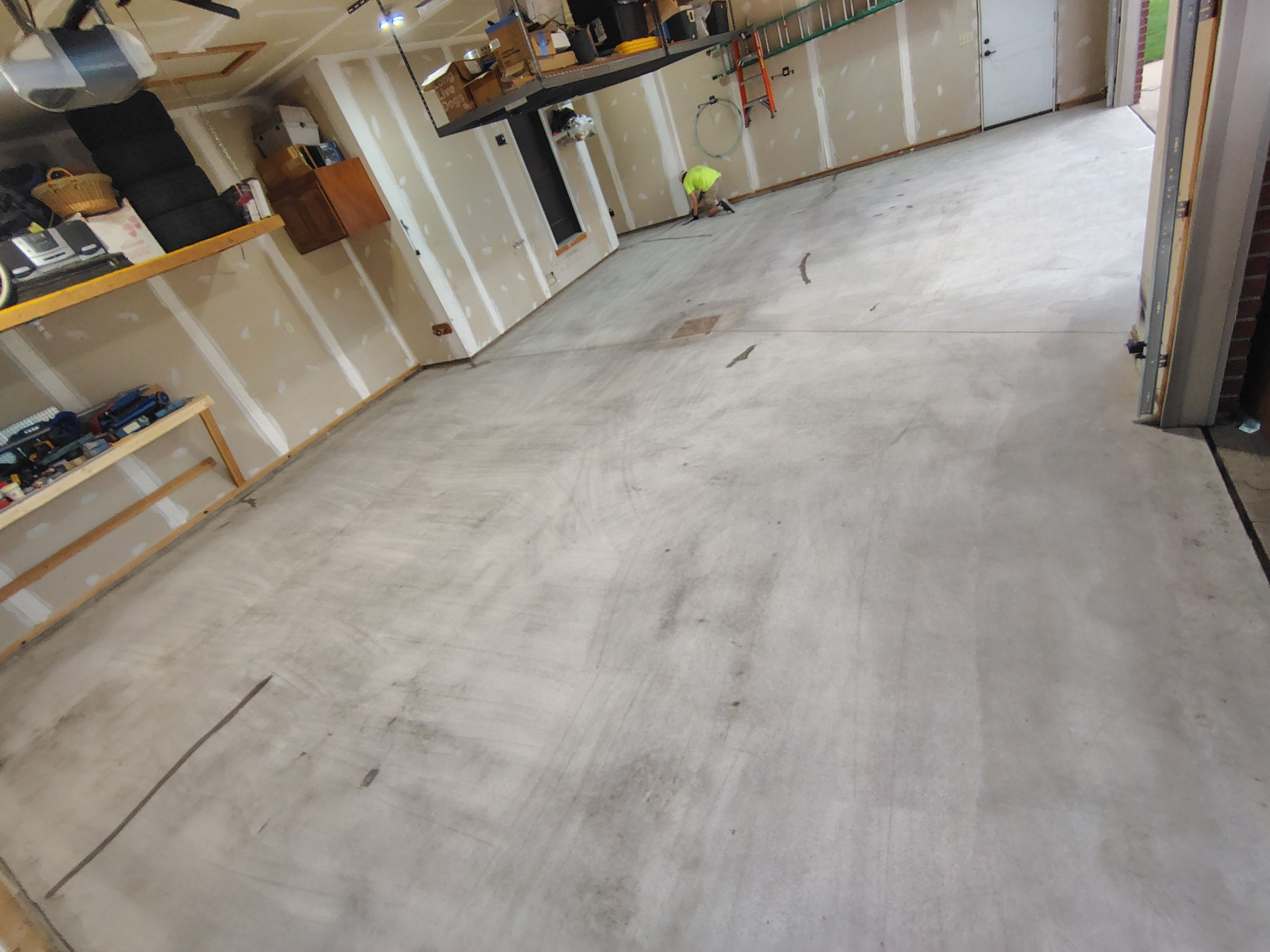 Sioux Falls Garage Concrete Grinding and Nightfall Decorative Chip Coating by Select Painting, Coatings & Garage Cabinets