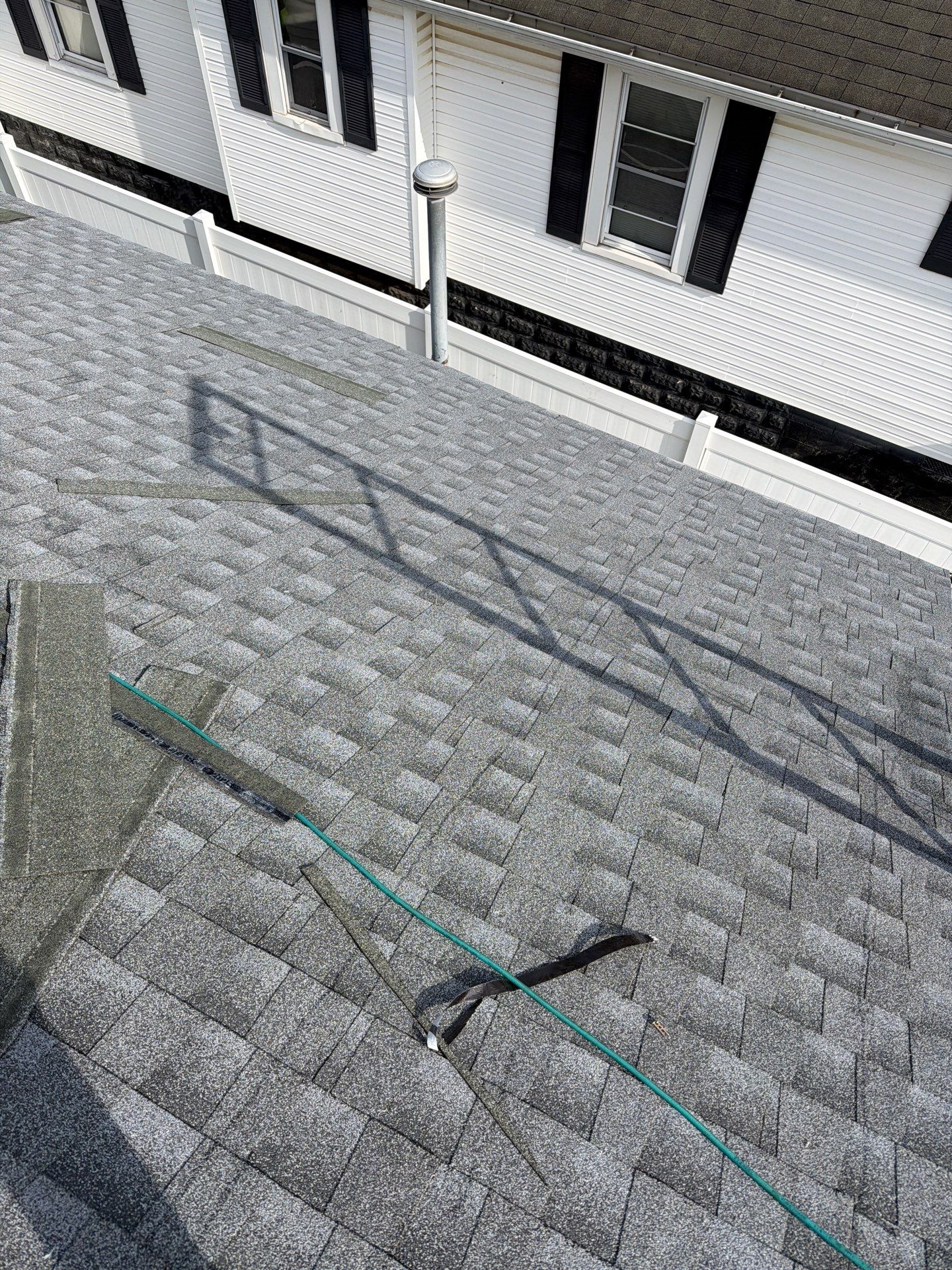 Residential Roofing Installation using GAF Timberline HDZ Oyster Grey by Rainstoppers Roofing