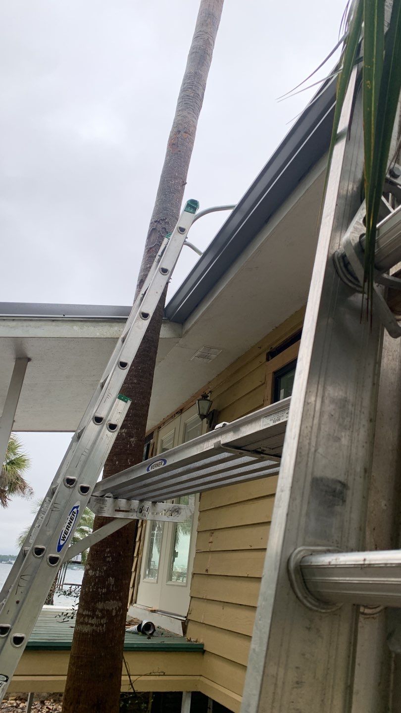 Seamless Gutter Installation using Charcoal Grey Gutters by Gutter Professors